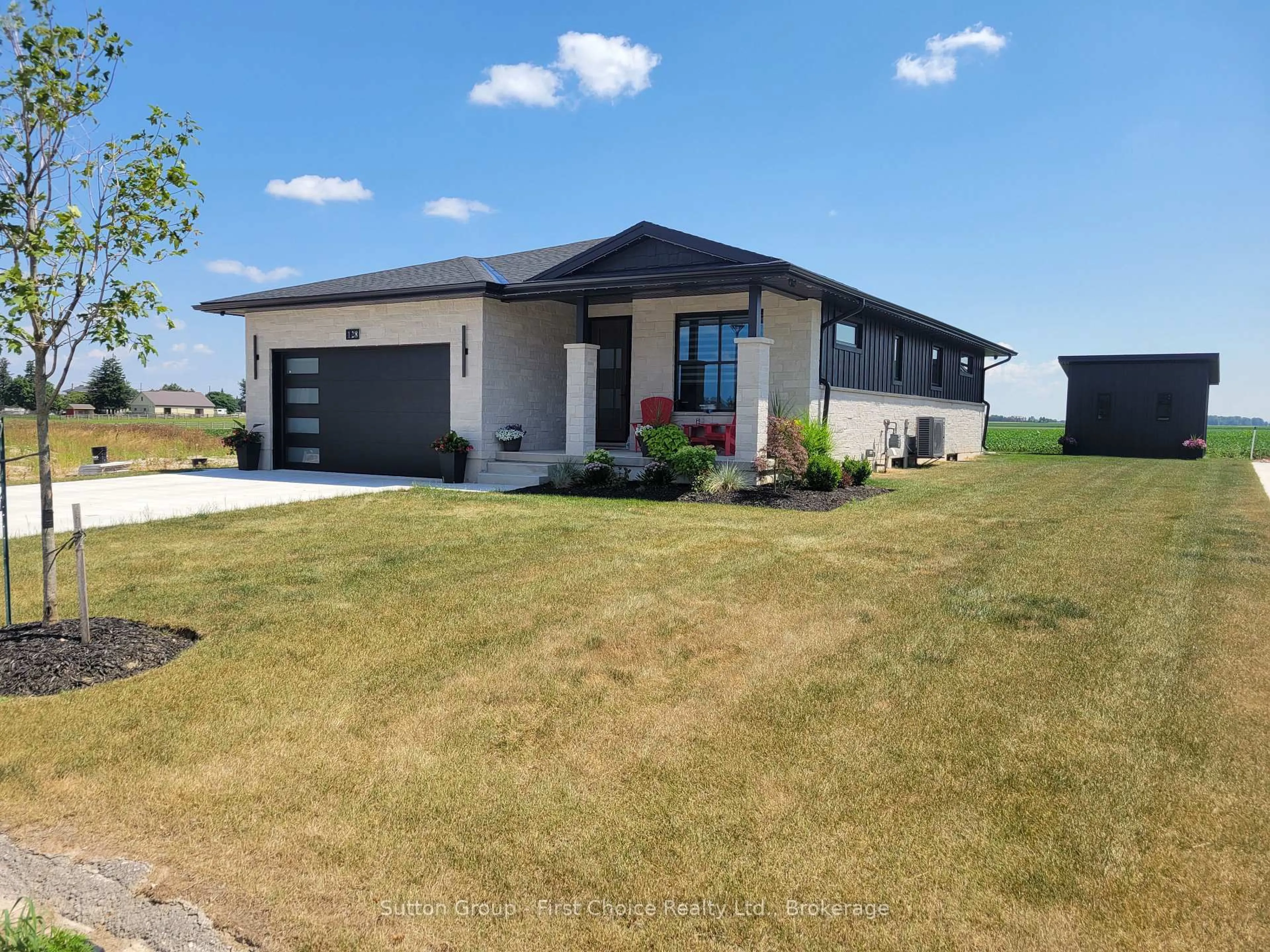 A pic from outside/outdoor area/front of a property/back of a property/a pic from drone, unknown for 128 Rowe Ave, South Huron Ontario N0M 1S1