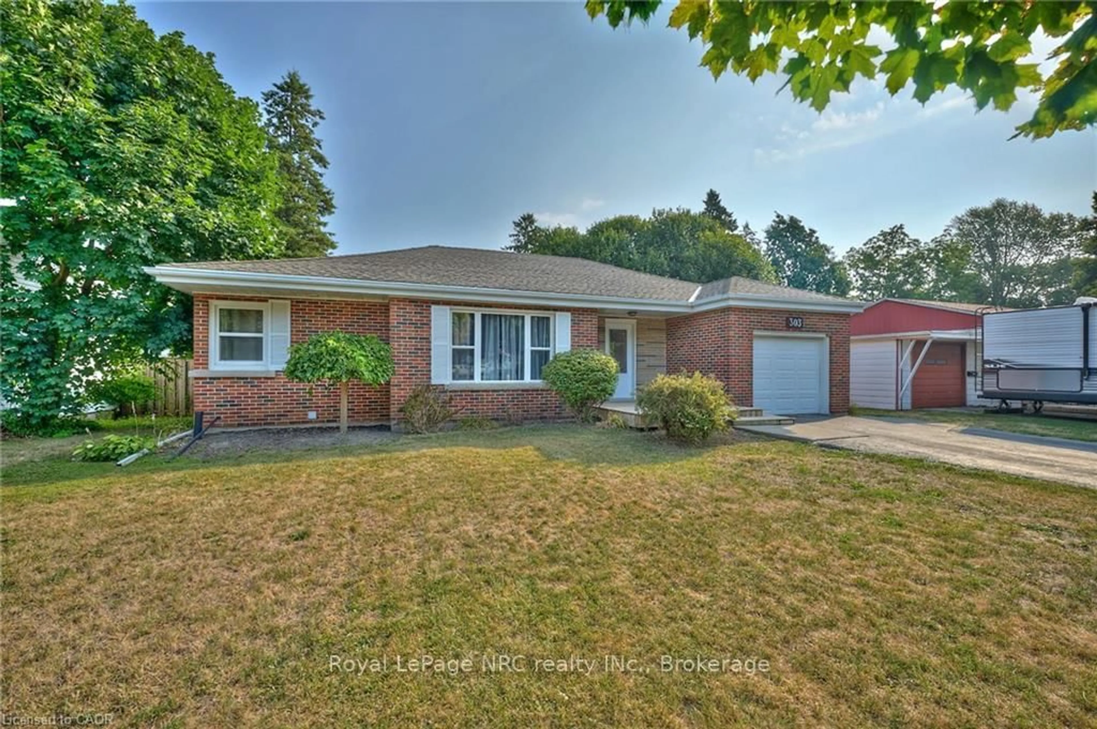 Home with brick exterior material, street for 303 Park Ave, Haldimand Ontario N1A 1M7
