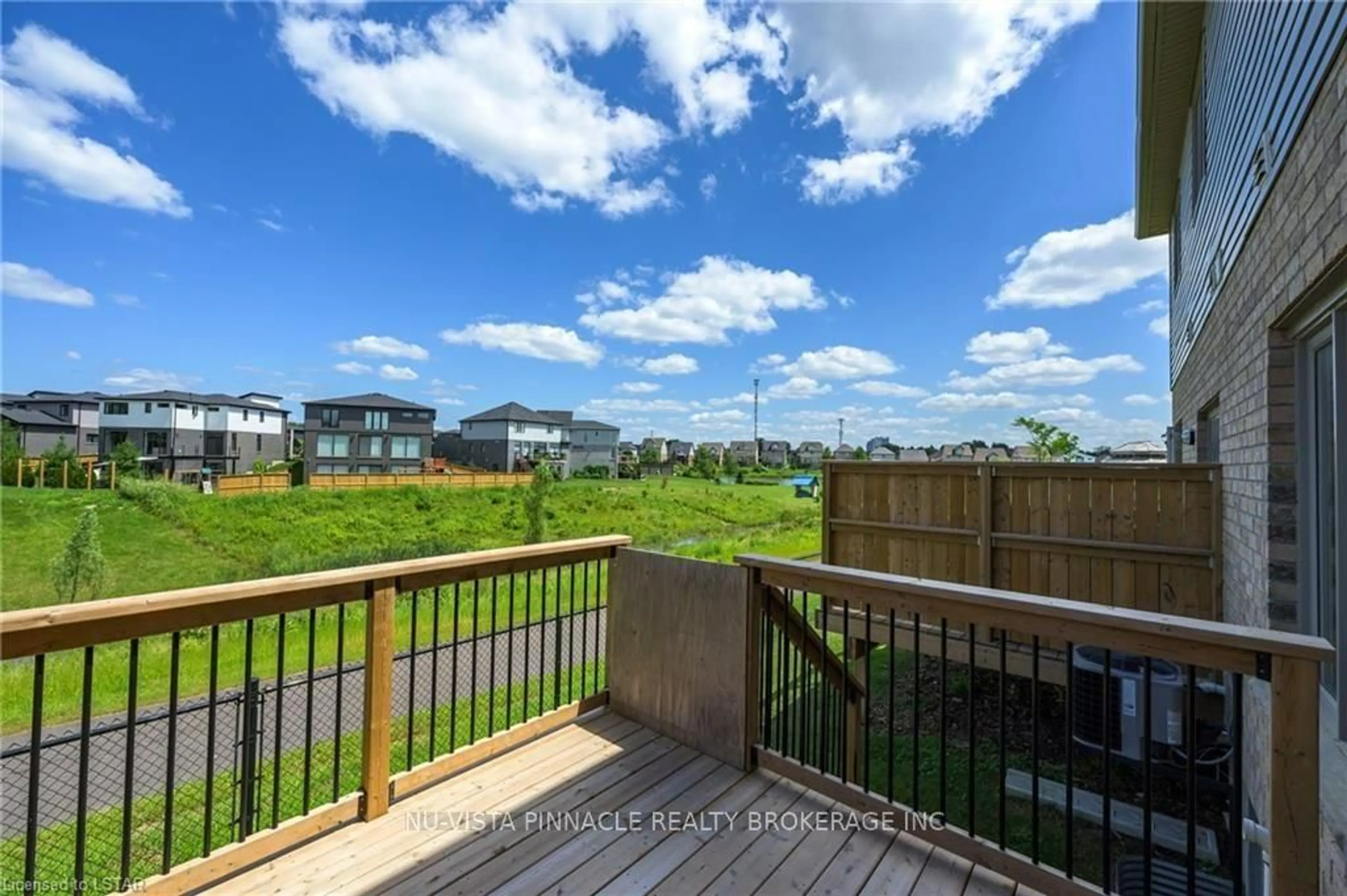 A pic from outside/outdoor area/front of a property/back of a property/a pic from drone, water/lake/river/ocean view for 2491 Tokala Tr #3, London North Ontario N6G 0X1