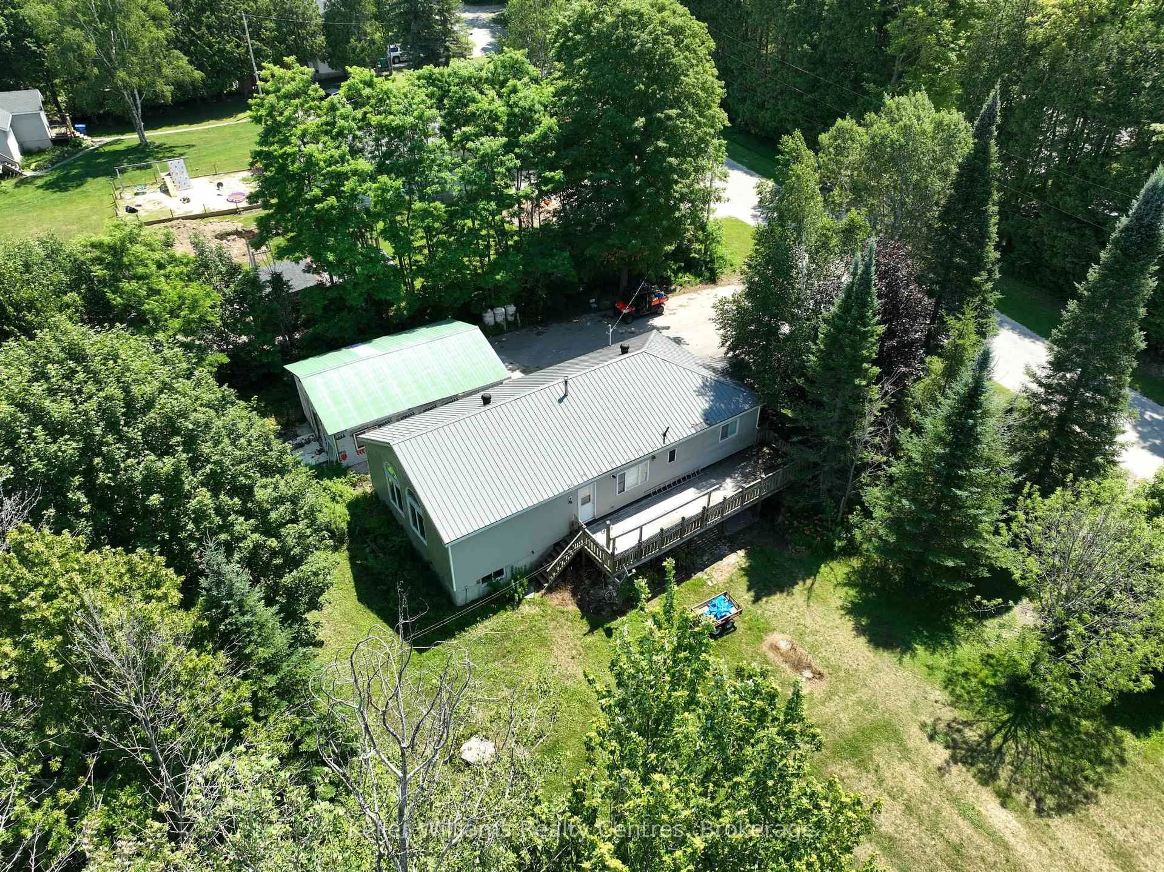 A pic from outside/outdoor area/front of a property/back of a property/a pic from drone, unknown for 242161 Concession 3 RR1, Georgian Bluffs Ontario N4K 5N7