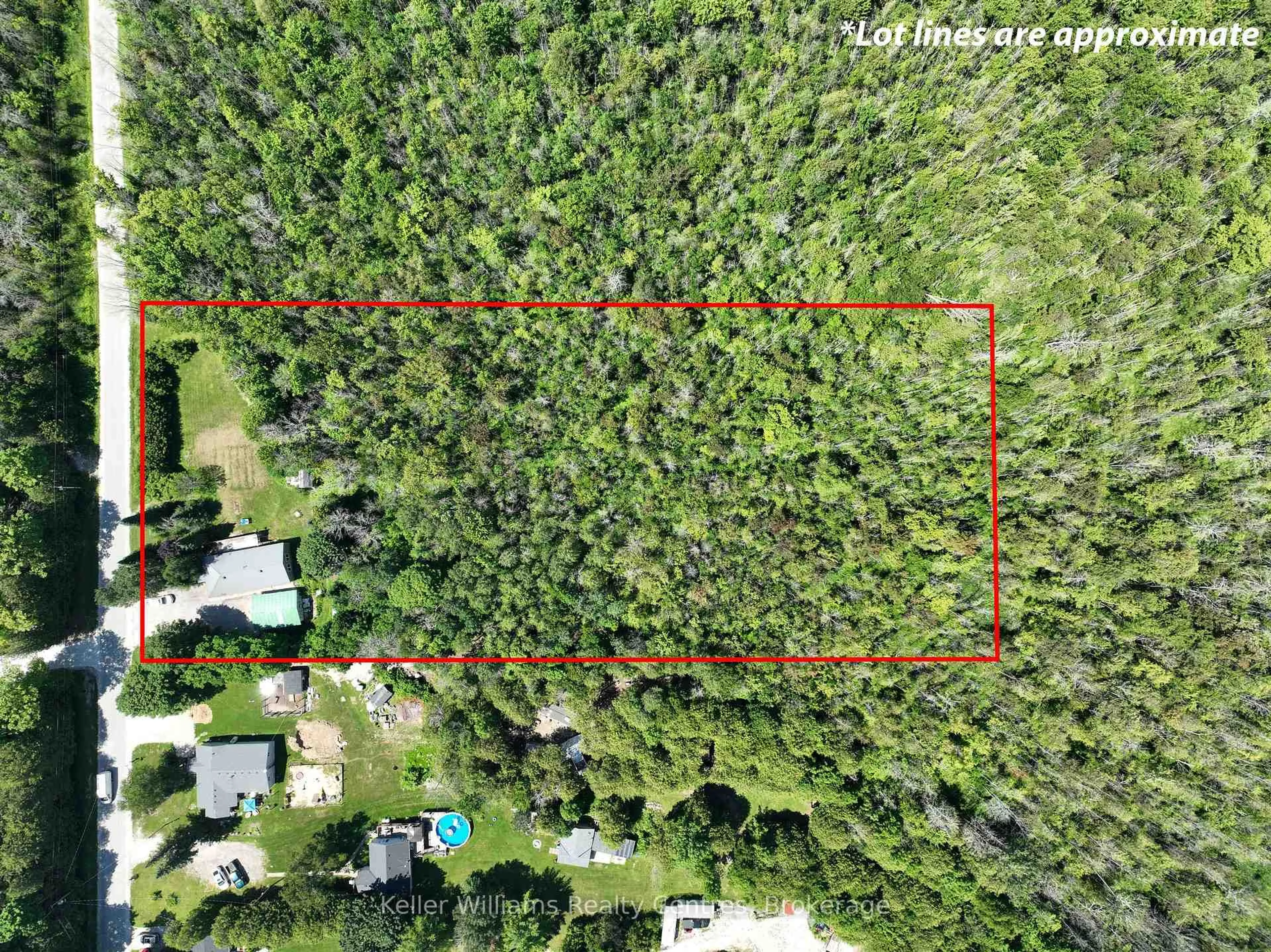 A pic from outside/outdoor area/front of a property/back of a property/a pic from drone, forest/trees view for 242161 Concession 3 RR1, Georgian Bluffs Ontario N4K 5N7