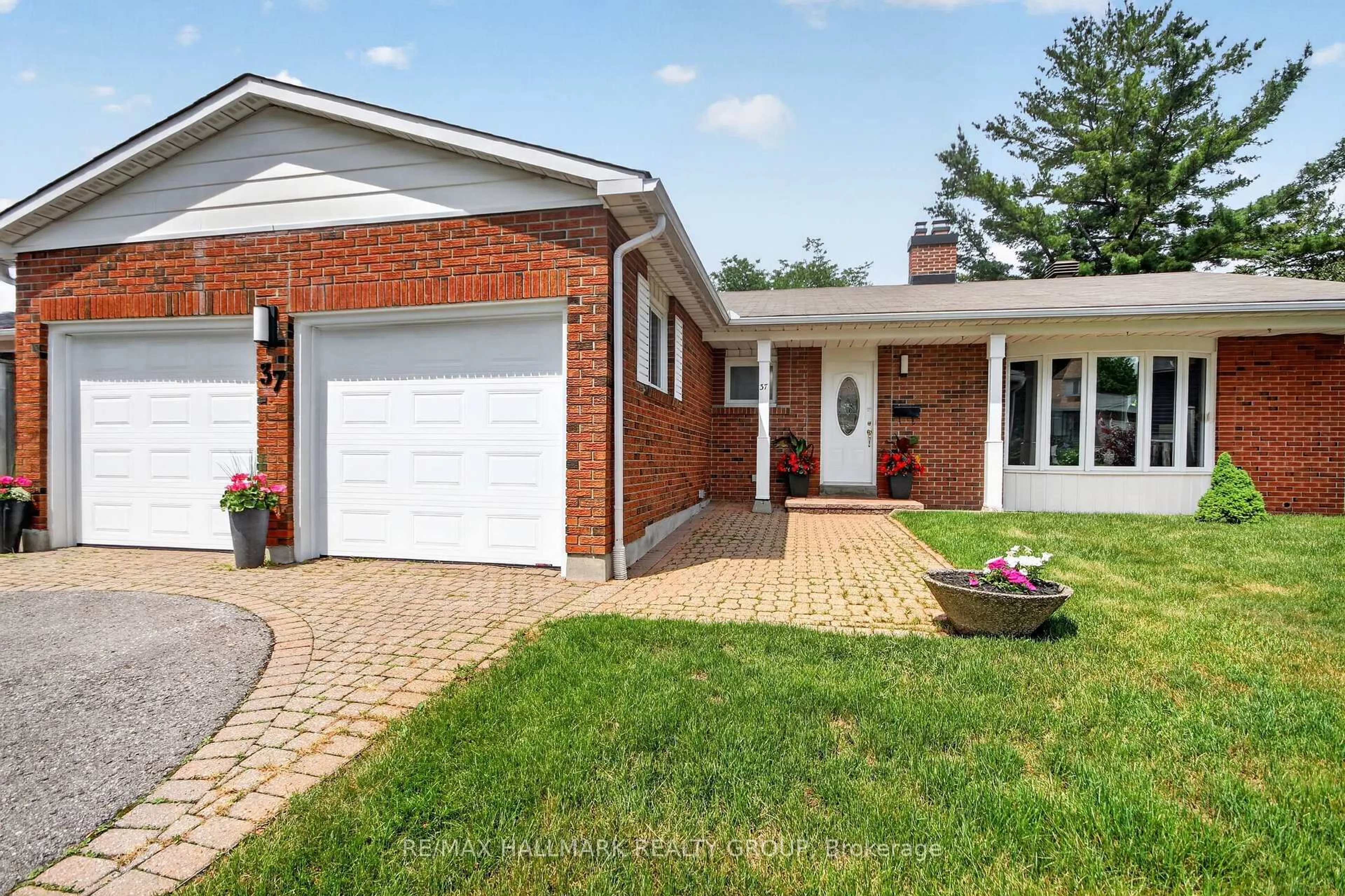 Home with brick exterior material, street for 37 Parkwood Cres, Ottawa Ontario K1B 3J5
