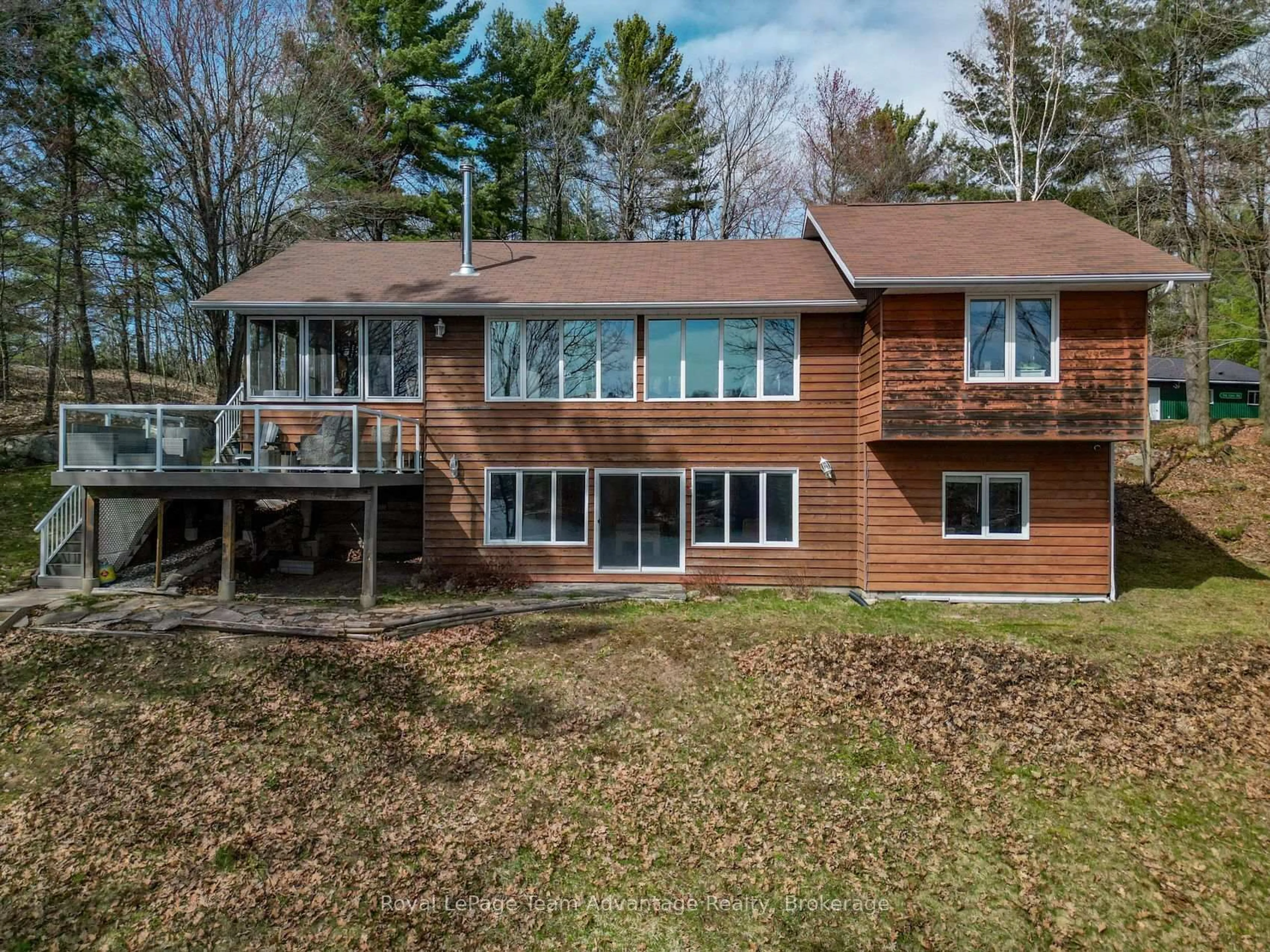A pic from outside/outdoor area/front of a property/back of a property/a pic from drone, water/lake/river/ocean view for 10 3rd Concession Rd, Carling Ontario P0G 1G0