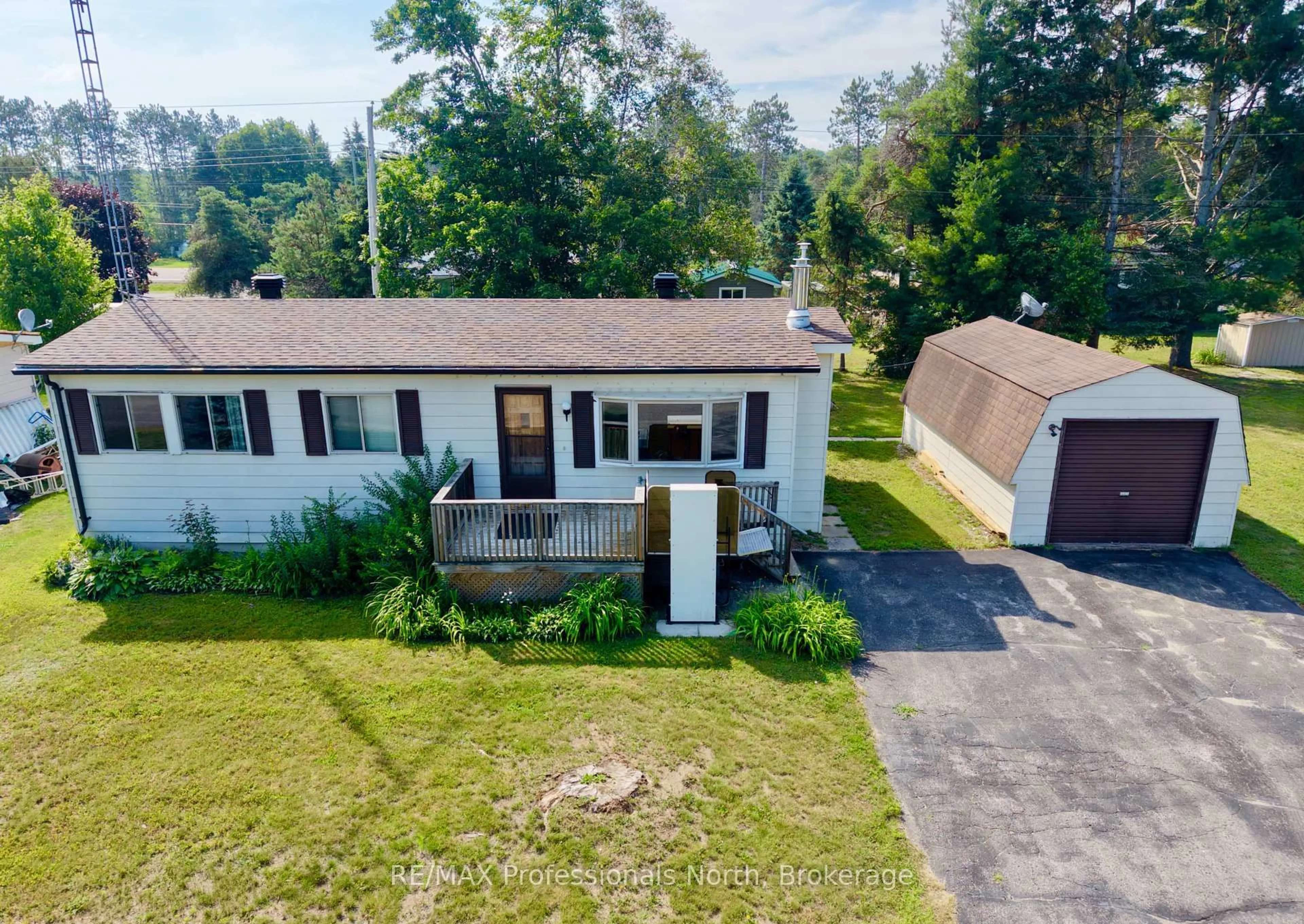 A pic from outside/outdoor area/front of a property/back of a property/a pic from drone, unknown for 1034 Eighth Lane, Minden Hills Ontario K0M 2K0