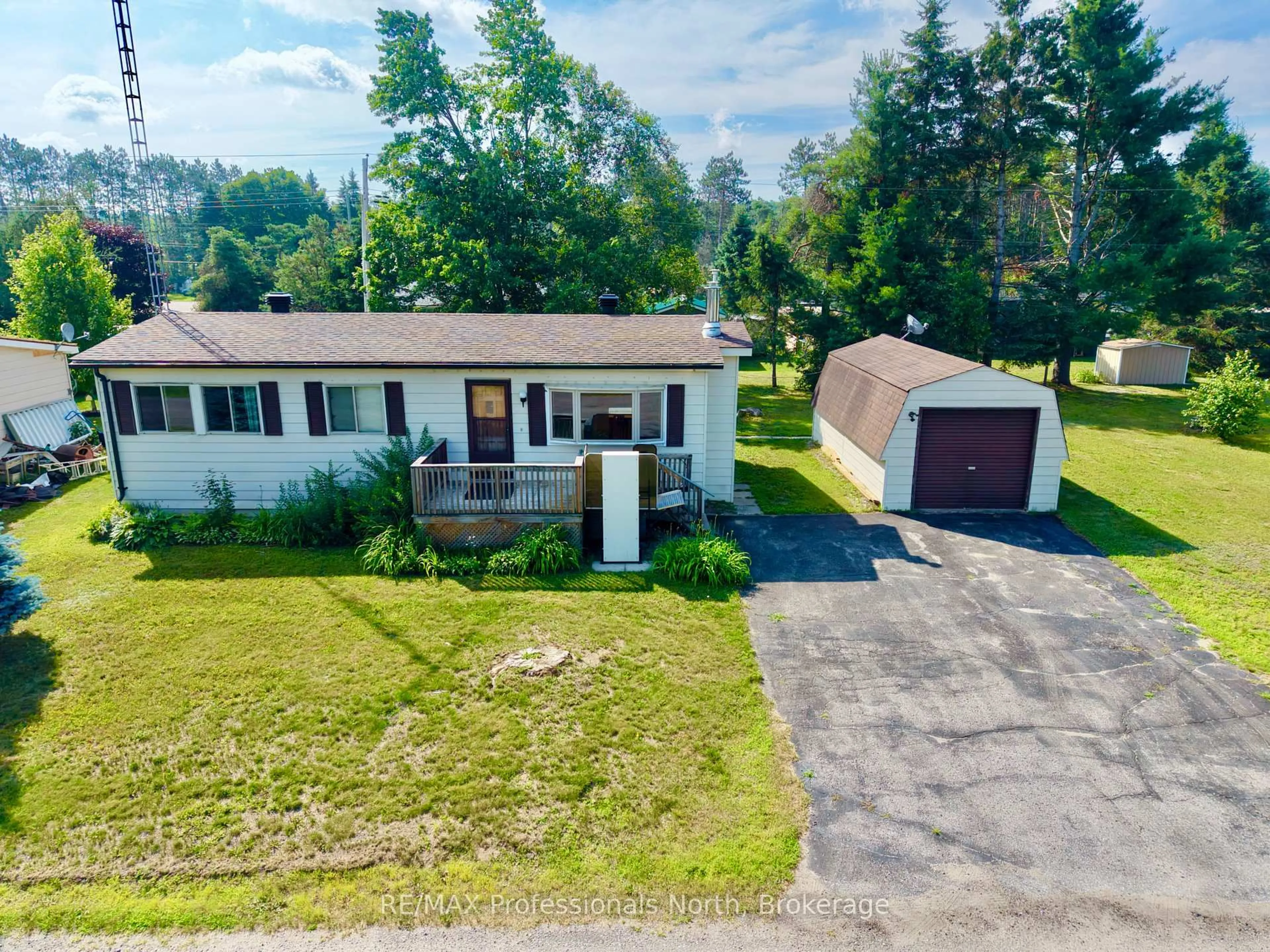 A pic from outside/outdoor area/front of a property/back of a property/a pic from drone, street for 1034 Eighth Lane, Minden Hills Ontario K0M 2K0
