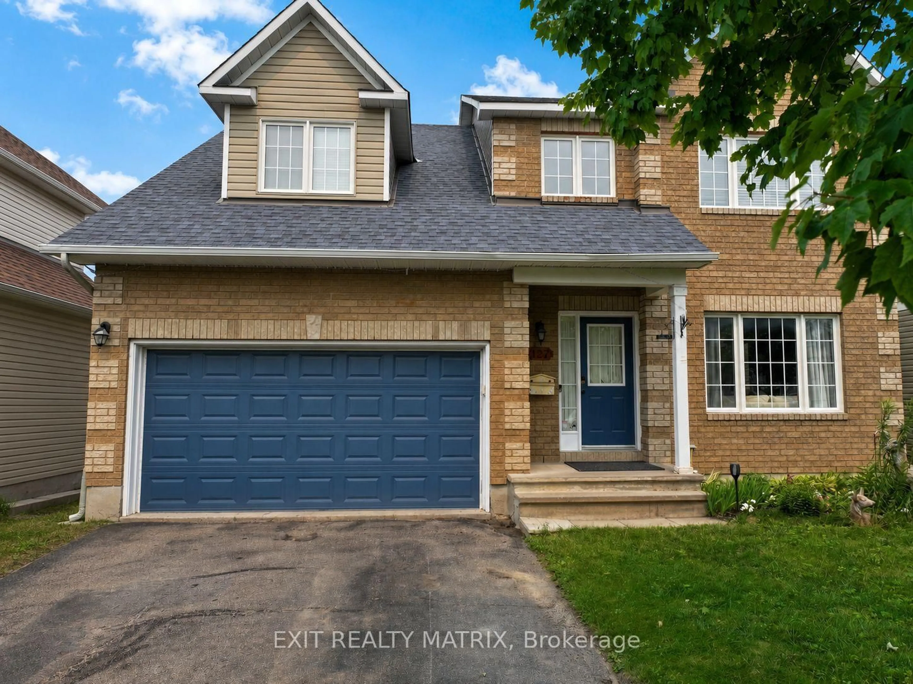 Home with brick exterior material, street for 127 Stoney Pond Crt, Ottawa Ontario K2S 2E6