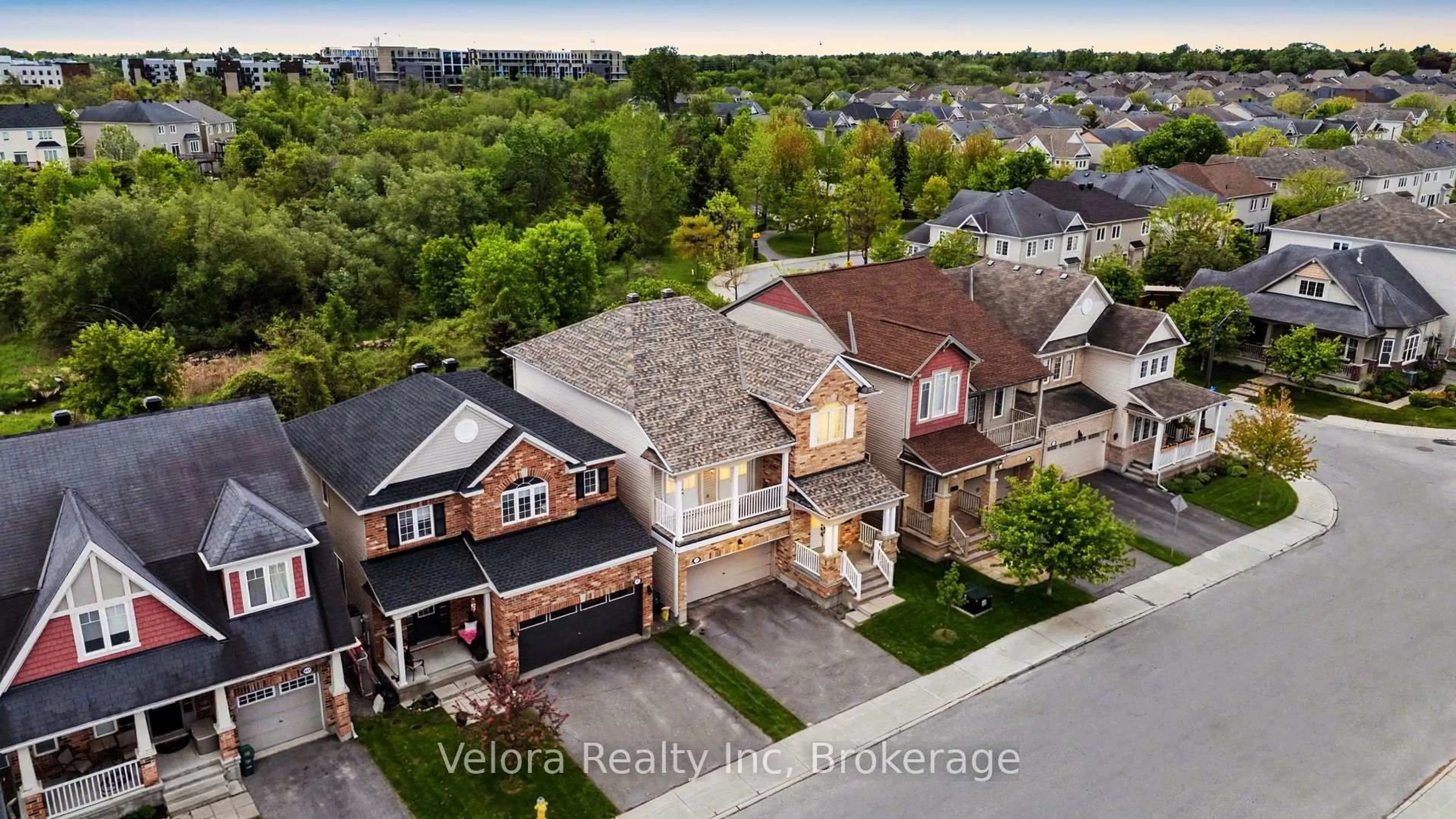A pic from outside/outdoor area/front of a property/back of a property/a pic from drone, street for 607 Rosehill Ave, Stittsville Ontario K2S 0K3
