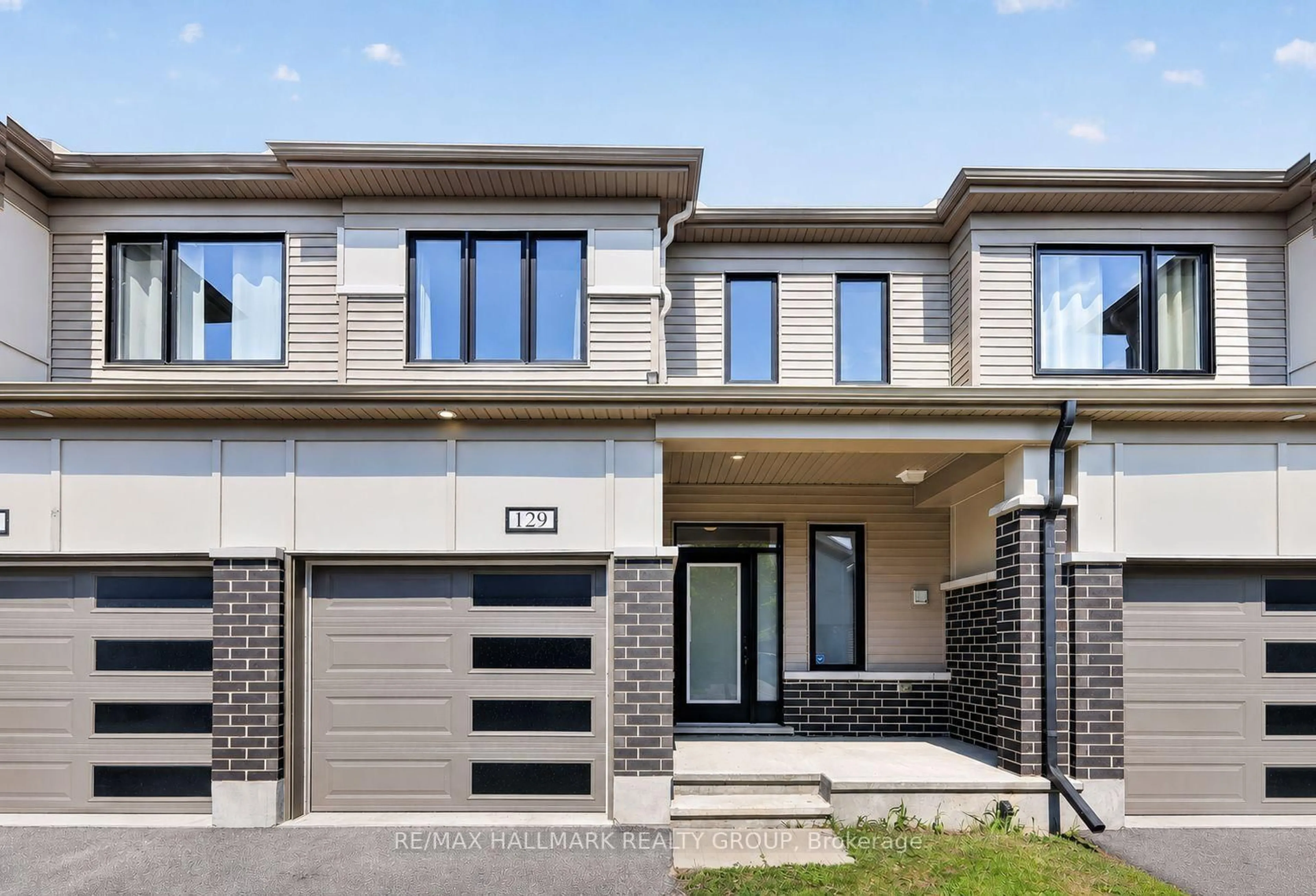 Home with brick exterior material, street for 129 Umbra Pl, Ottawa Ontario K2J 6N7