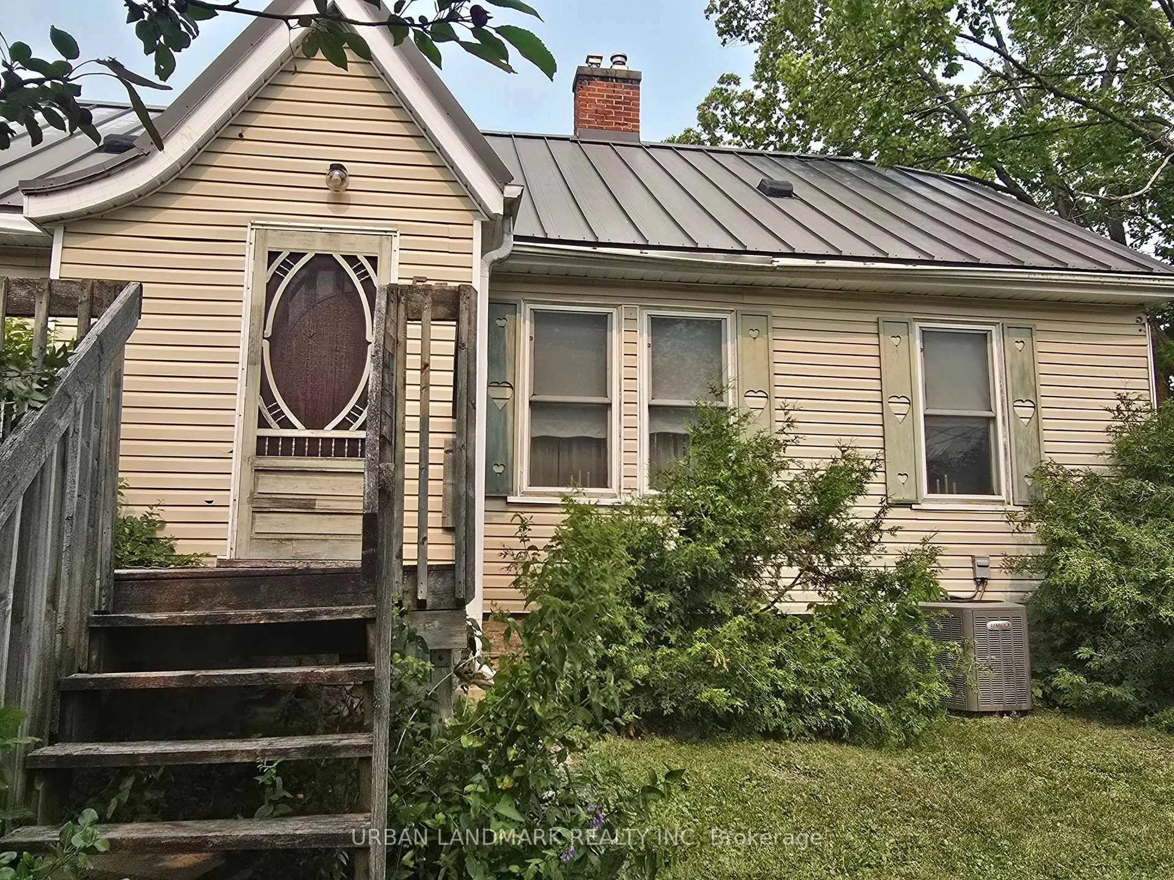 Home with vinyl exterior material, street for 55 Nelson St, Madoc Ontario K0K 2K0