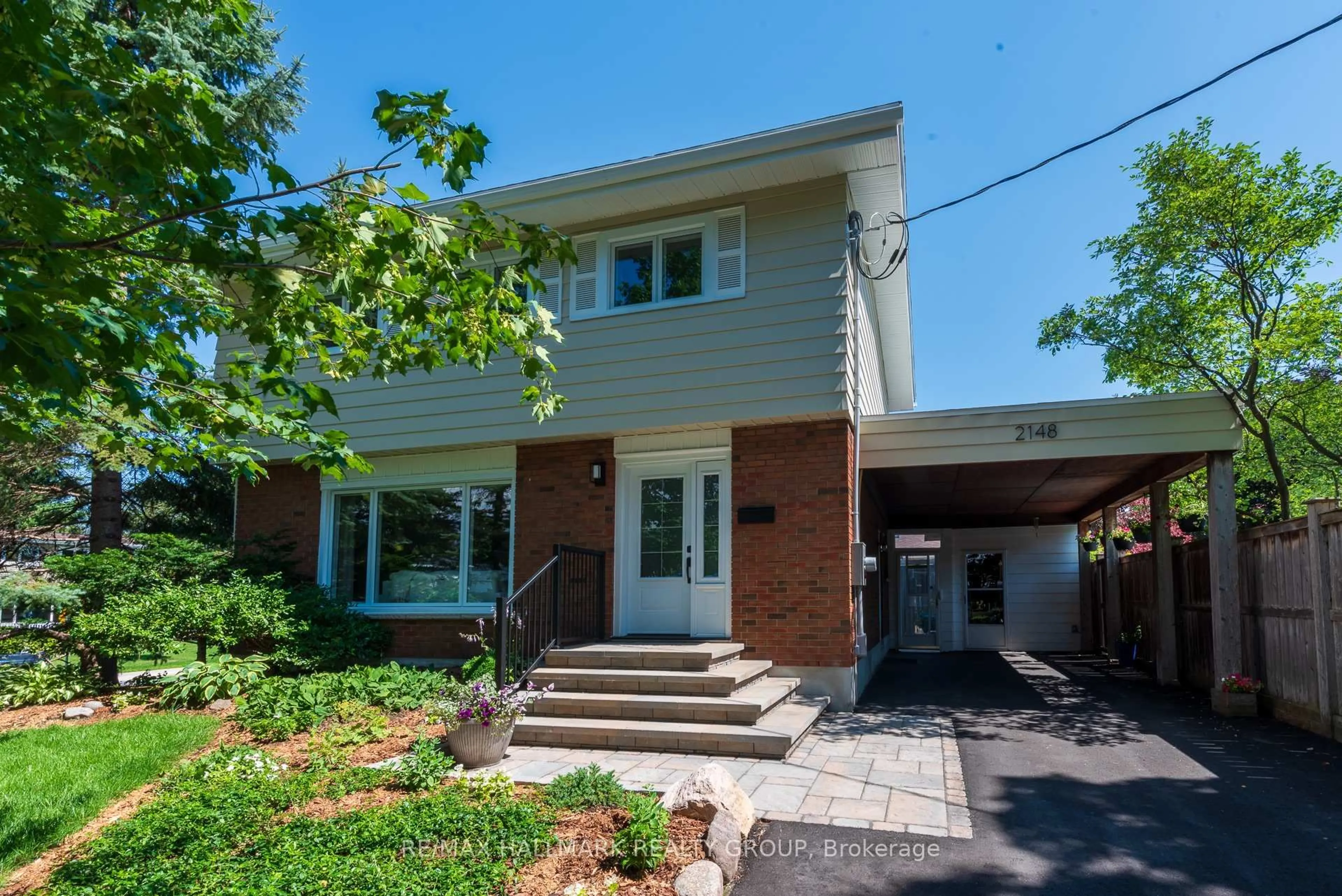 Home with brick exterior material, street for 2148 Dunelm St, Ottawa Ontario K1G 2S3