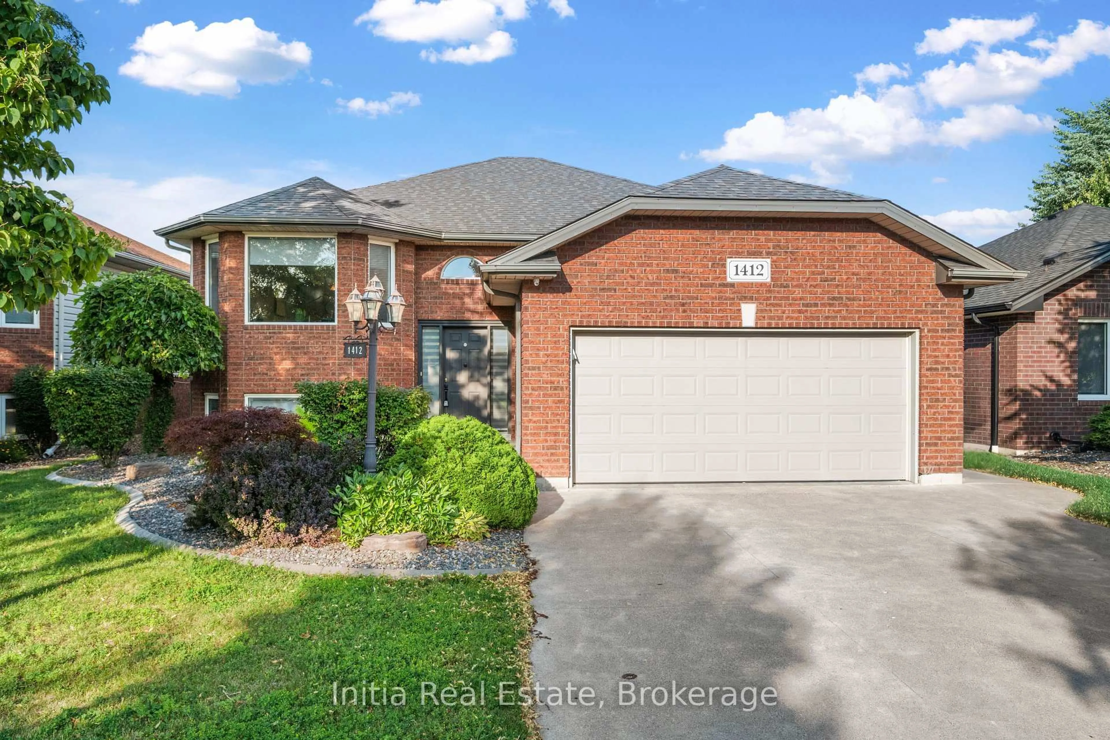 Home with brick exterior material, street for 1412 Katella Ave, Windsor Ontario N8P 1R4