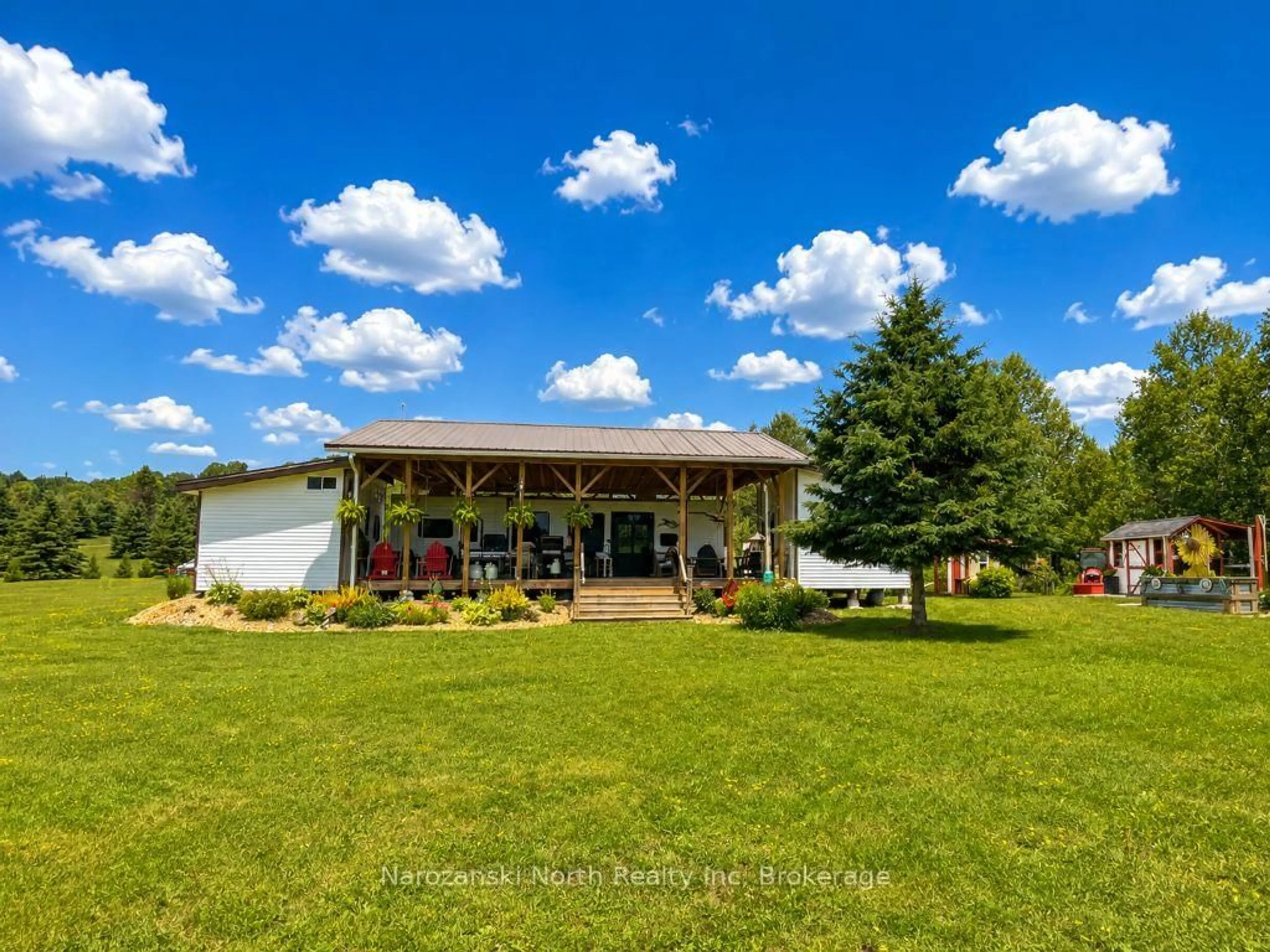 A pic from outside/outdoor area/front of a property/back of a property/a pic from drone, water/lake/river/ocean view for 2708 HWY 539 Highway, West Nipissing Ontario P0M 1R0