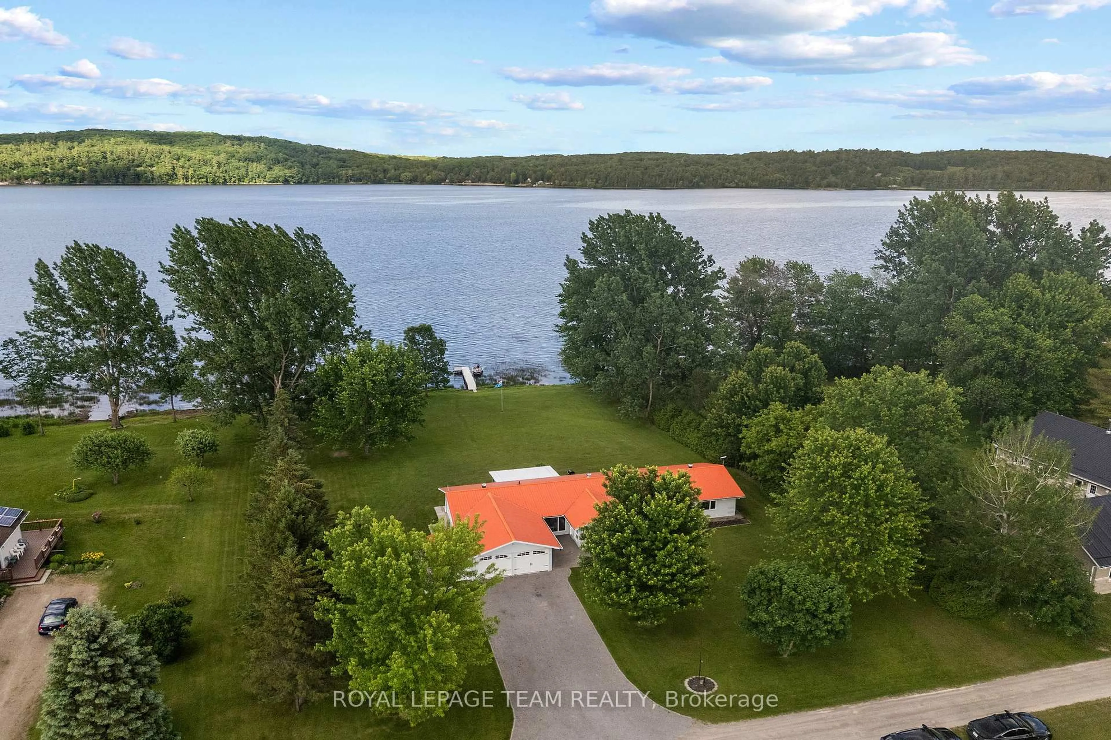 A pic from outside/outdoor area/front of a property/back of a property/a pic from drone, water/lake/river/ocean view for 34 Bird Lake Tr, Cobden Ontario K0J 1K0