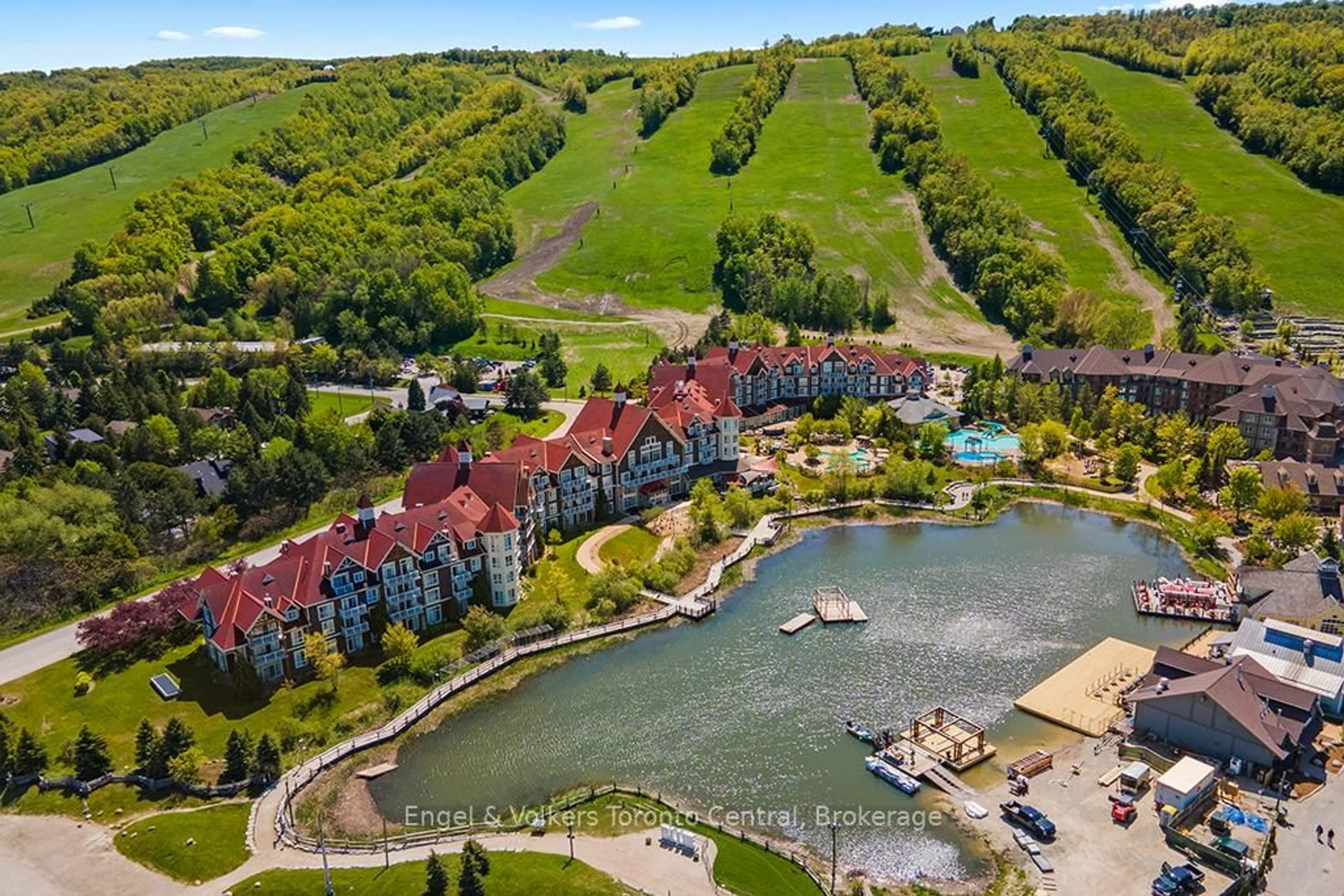 A pic from outside/outdoor area/front of a property/back of a property/a pic from drone, water/lake/river/ocean view for 220 Gord Canning Dr #265, Blue Mountains Ontario L9Y 0V2