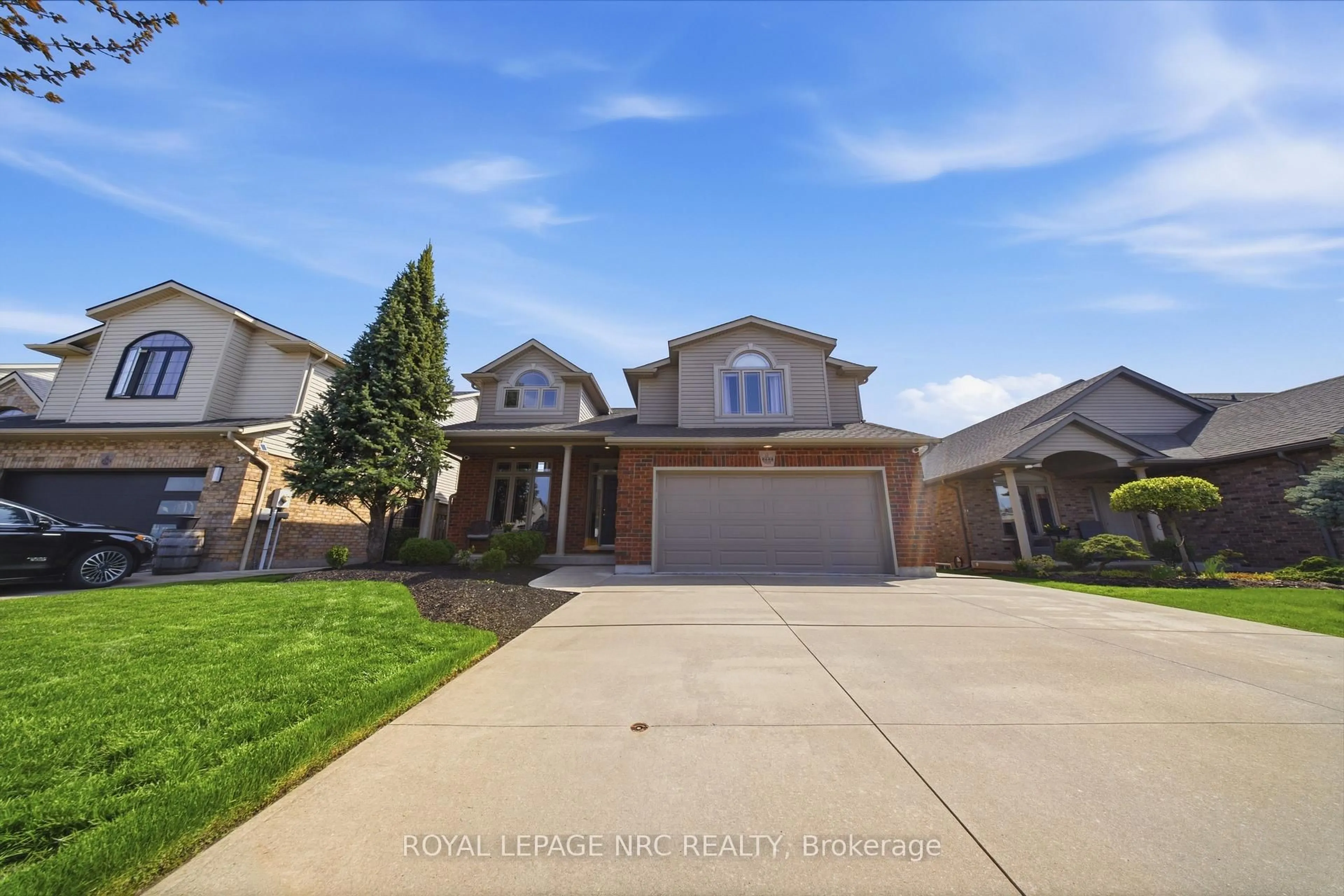 Home with vinyl exterior material, street for 8684 McGarry Dr, Niagara Falls Ontario L2H 3N7
