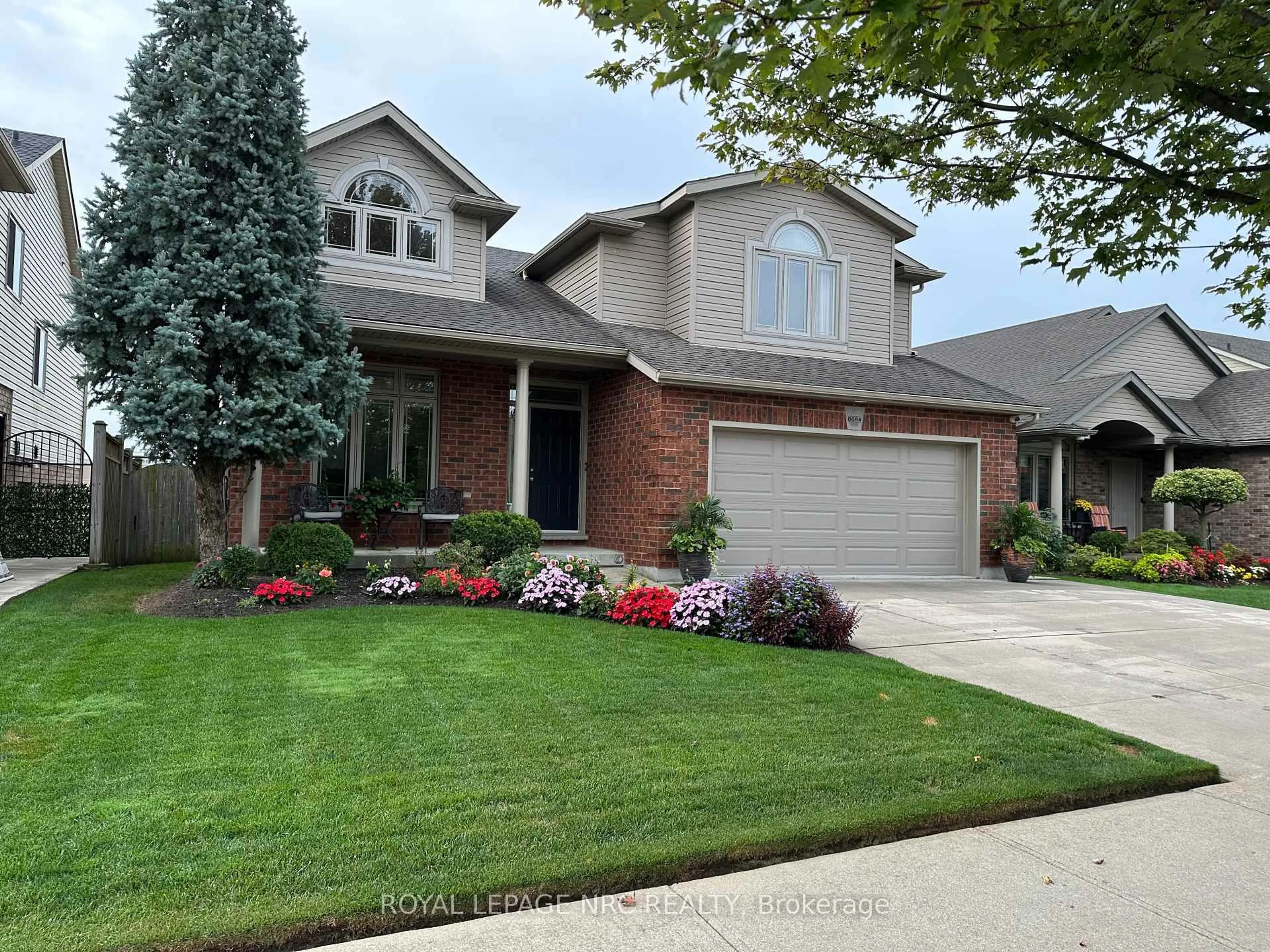Home with brick exterior material, street for 8684 McGarry Dr, Niagara Falls Ontario L2H 3N7