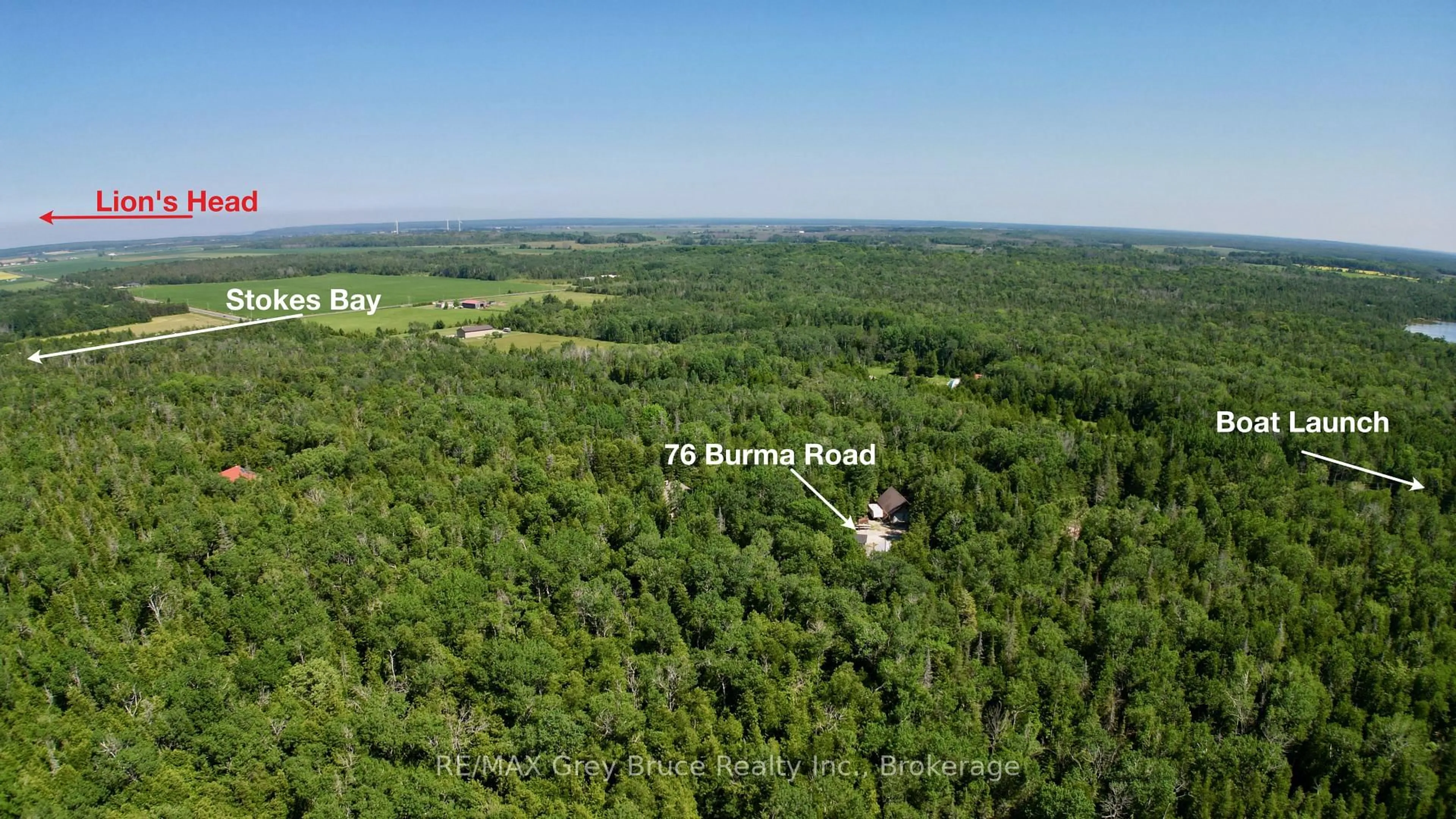 A pic from outside/outdoor area/front of a property/back of a property/a pic from drone, forest/trees view for 76 BURMA Rd, Northern Bruce Peninsula Ontario N0H 1W0