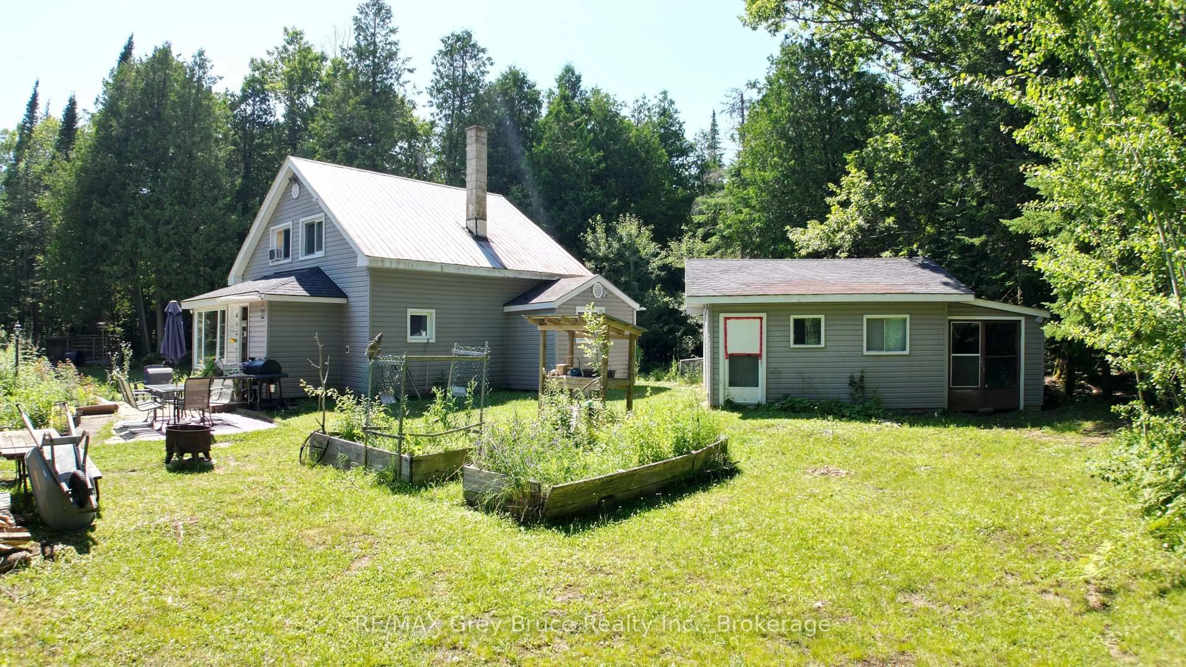 A pic from outside/outdoor area/front of a property/back of a property/a pic from drone, unknown for 76 BURMA Rd, Northern Bruce Peninsula Ontario N0H 1W0