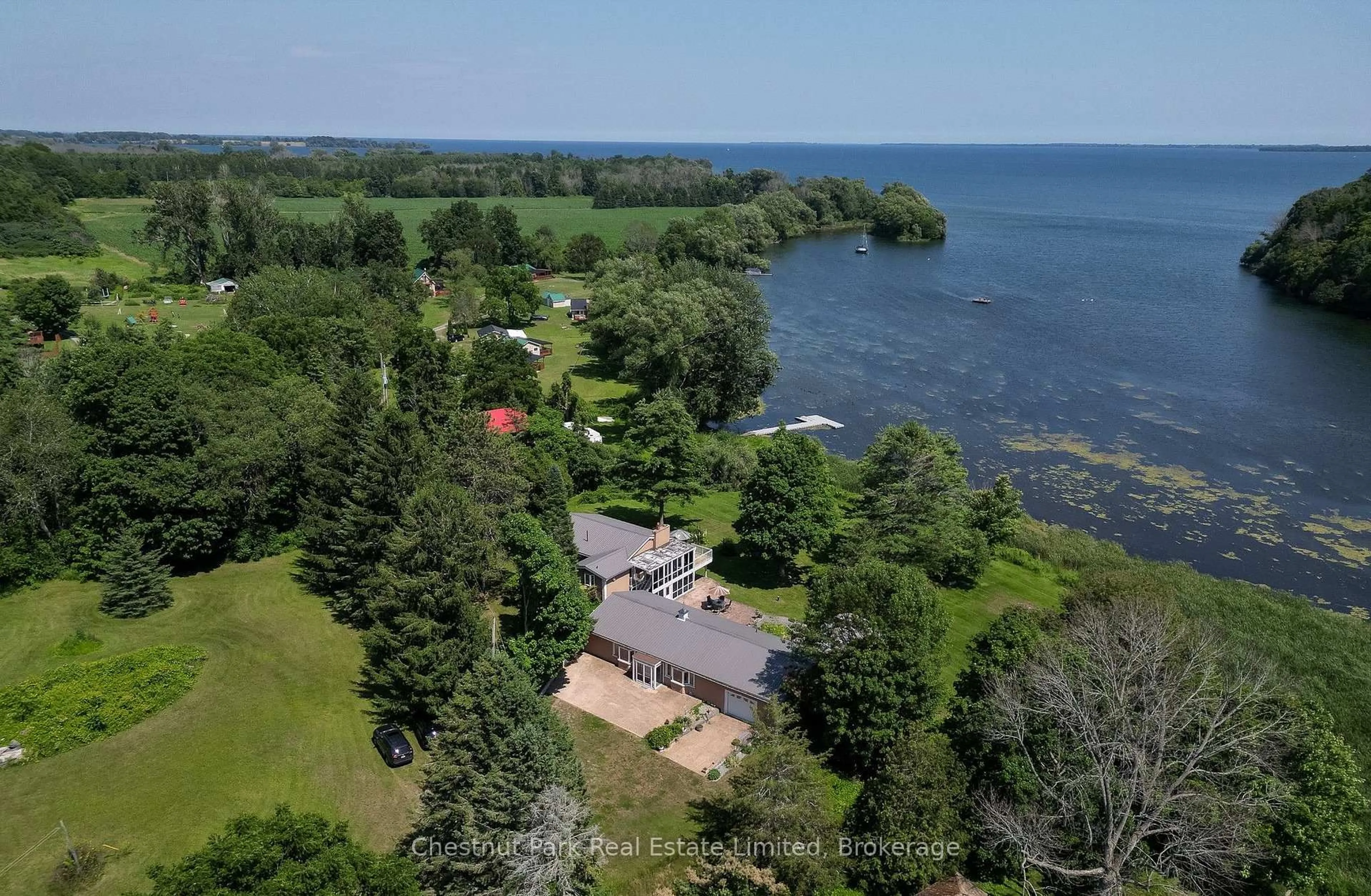 A pic from outside/outdoor area/front of a property/back of a property/a pic from drone, water/lake/river/ocean view for 70C Morrison Point Rd, Prince Edward County Ontario K0K 2P0