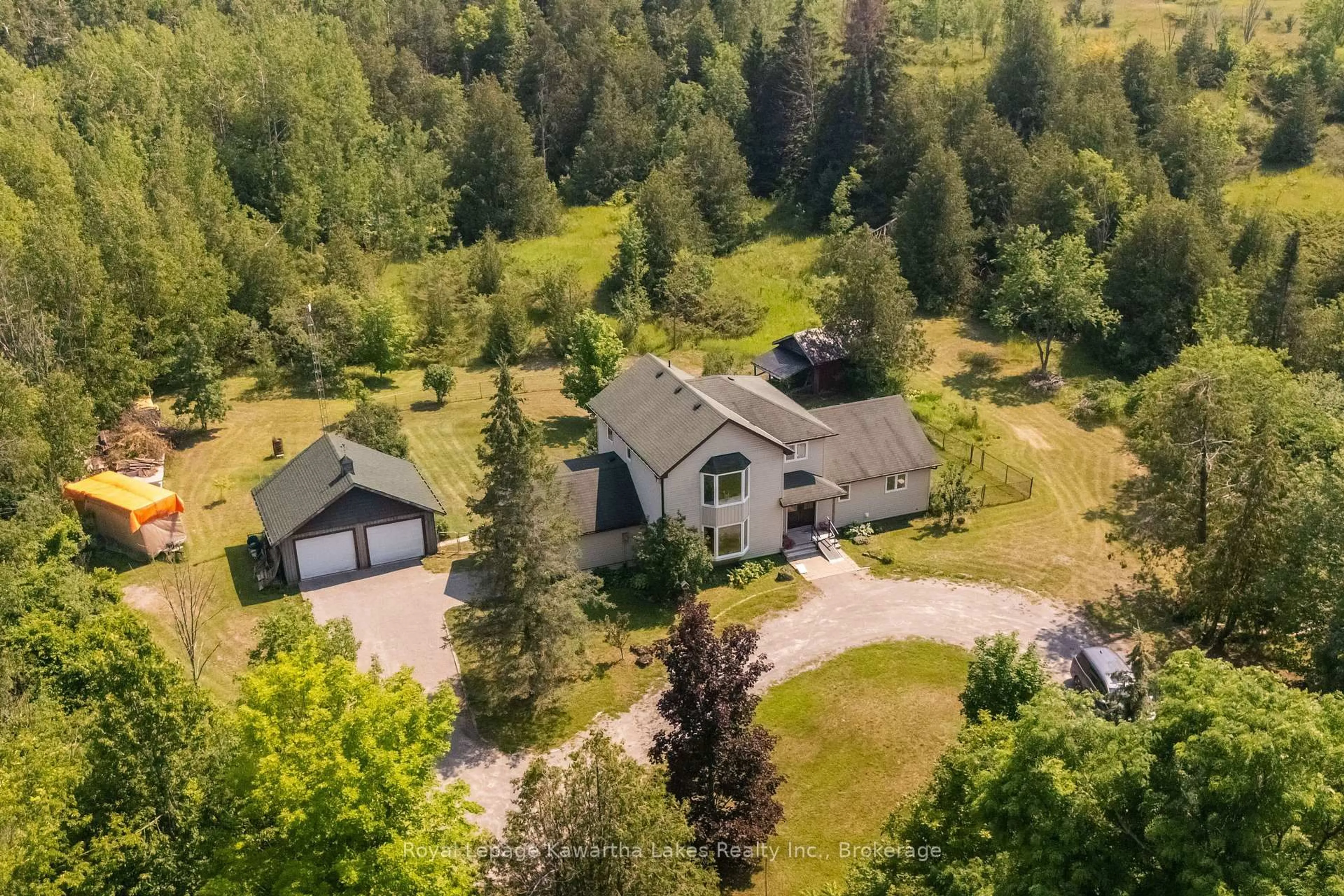 A pic from outside/outdoor area/front of a property/back of a property/a pic from drone, unknown for 9 Rosco Lane, Kawartha Lakes Ontario K0M 1N0