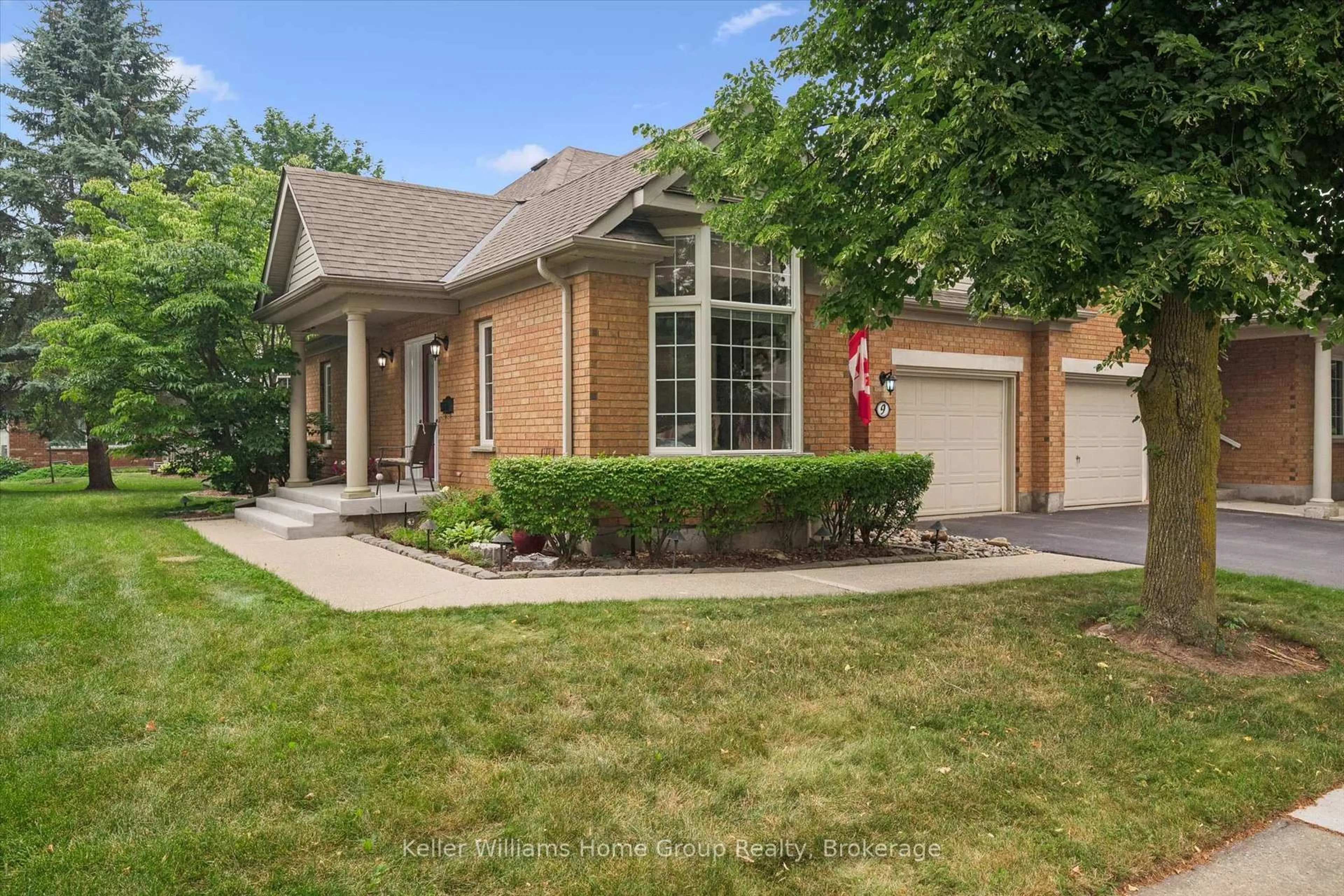 Home with brick exterior material, street for 9 Magnolia Lane, Guelph Ontario N1G 4X1