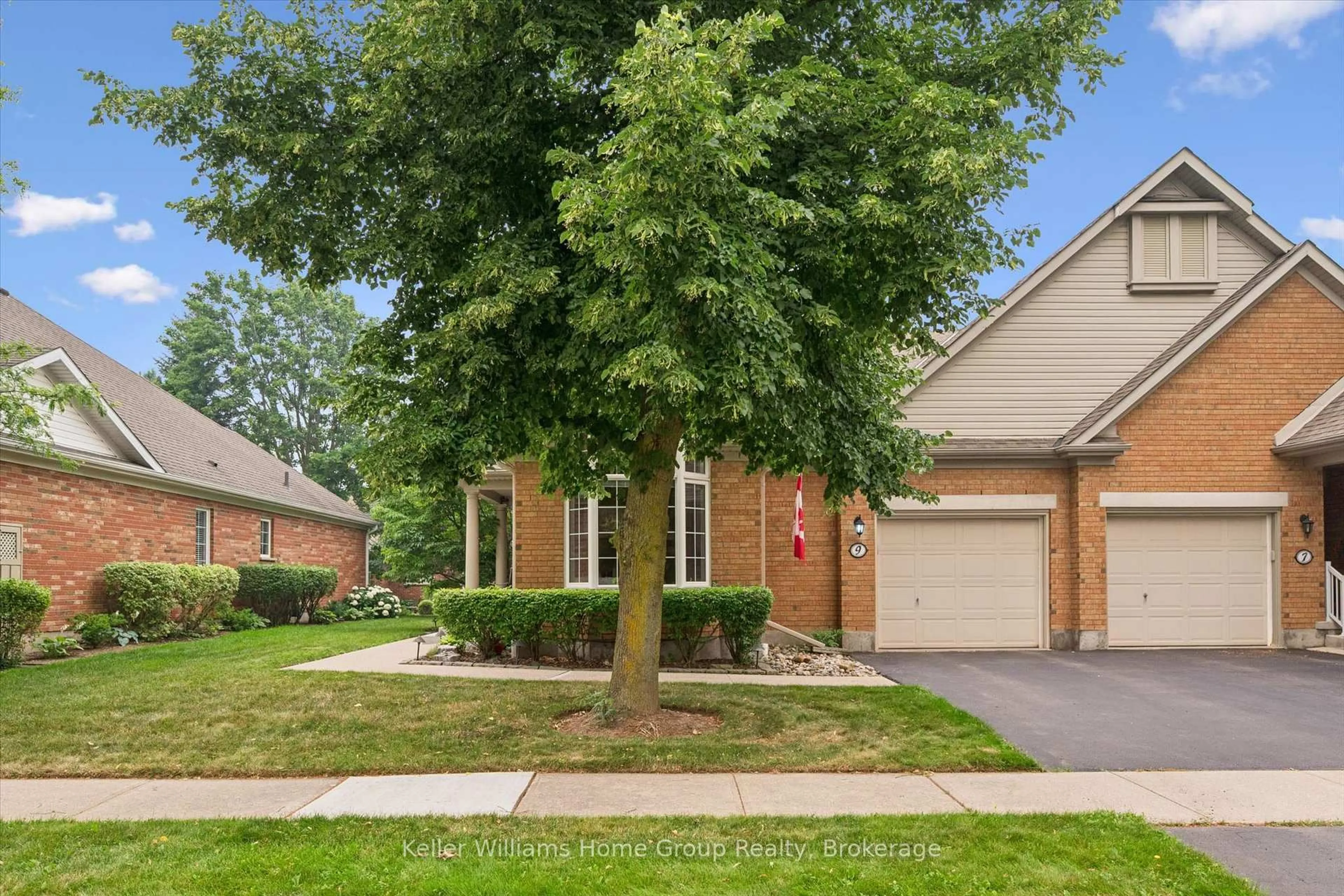 Home with brick exterior material, street for 9 Magnolia Lane, Guelph Ontario N1G 4X1
