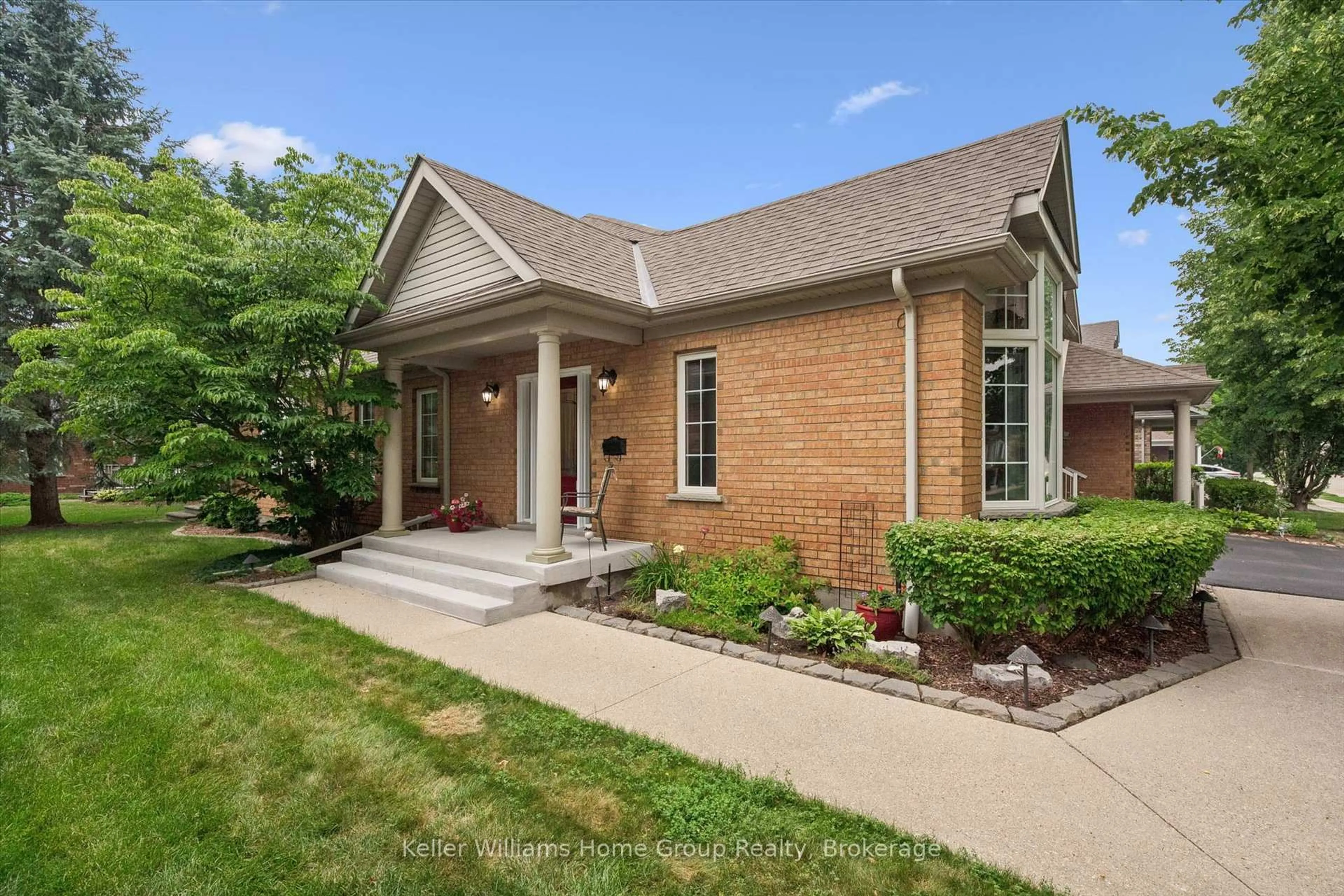 Home with brick exterior material, street for 9 Magnolia Lane, Guelph Ontario N1G 4X1