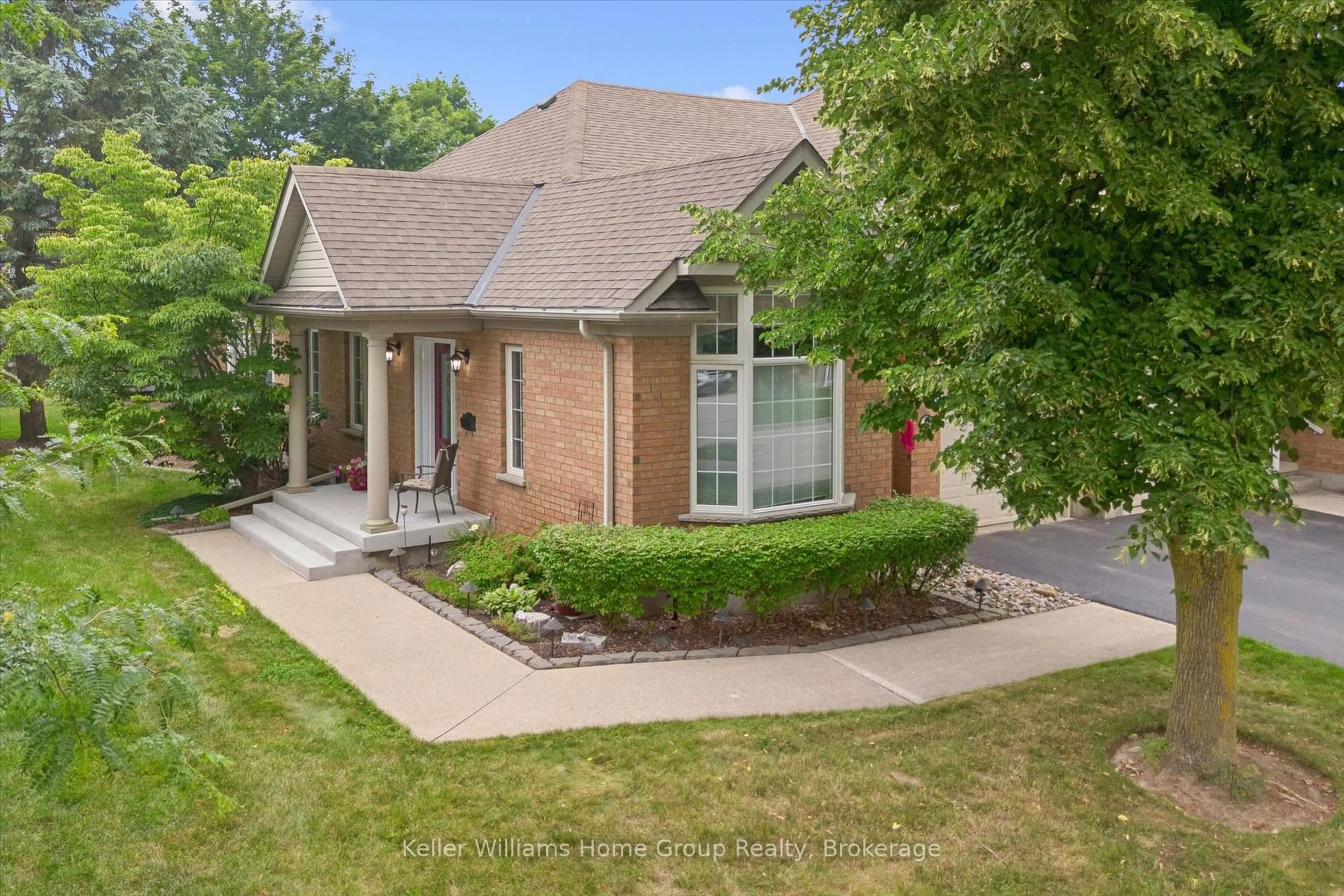 Home with brick exterior material, street for 9 Magnolia Lane, Guelph Ontario N1G 4X1