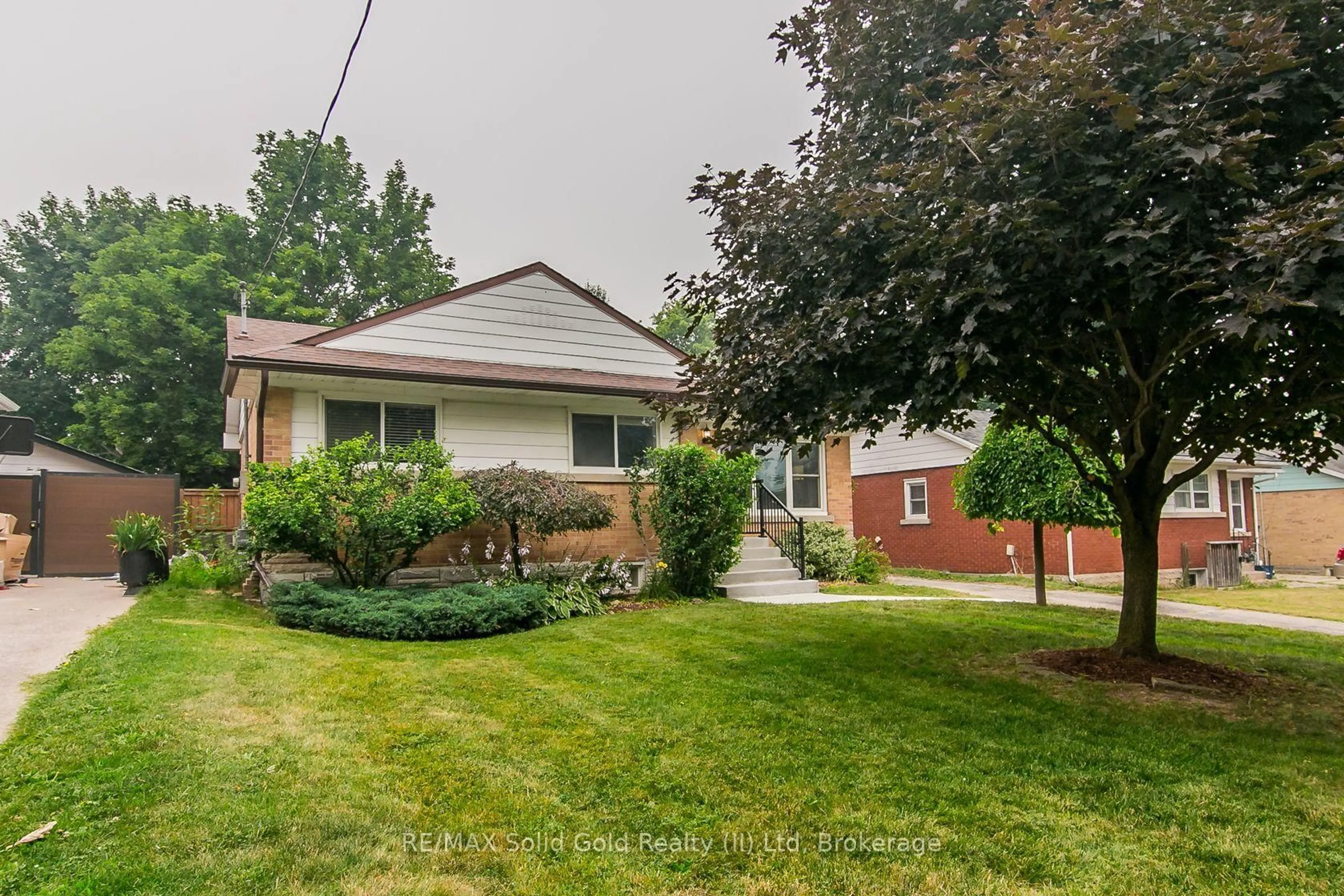 Home with brick exterior material, street for 210 Dawson St, Waterloo Ontario N2L 1S4