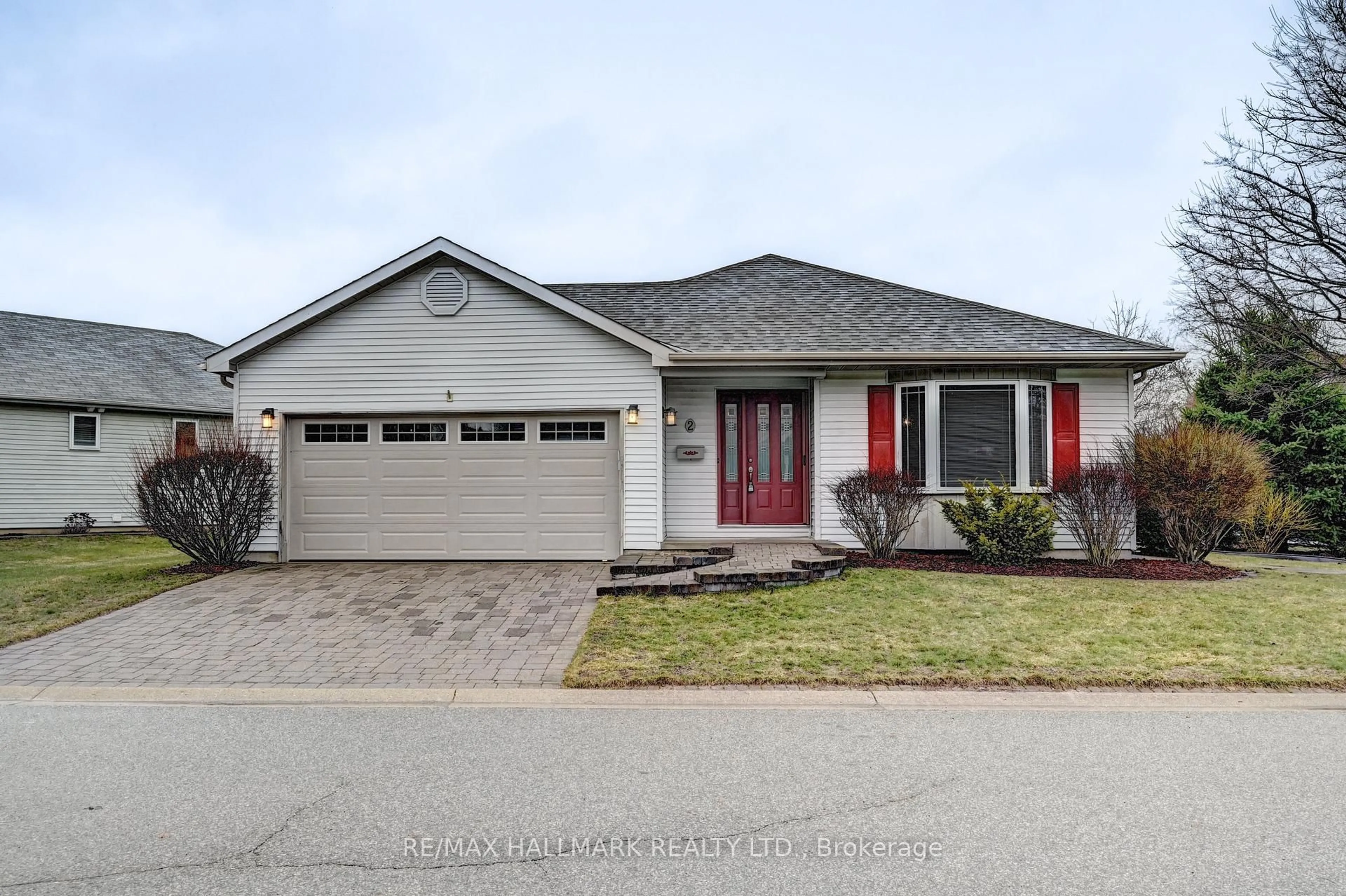 Home with vinyl exterior material, street for 2 Brasher Dr, Tillsonburg Ontario N4G 5T2