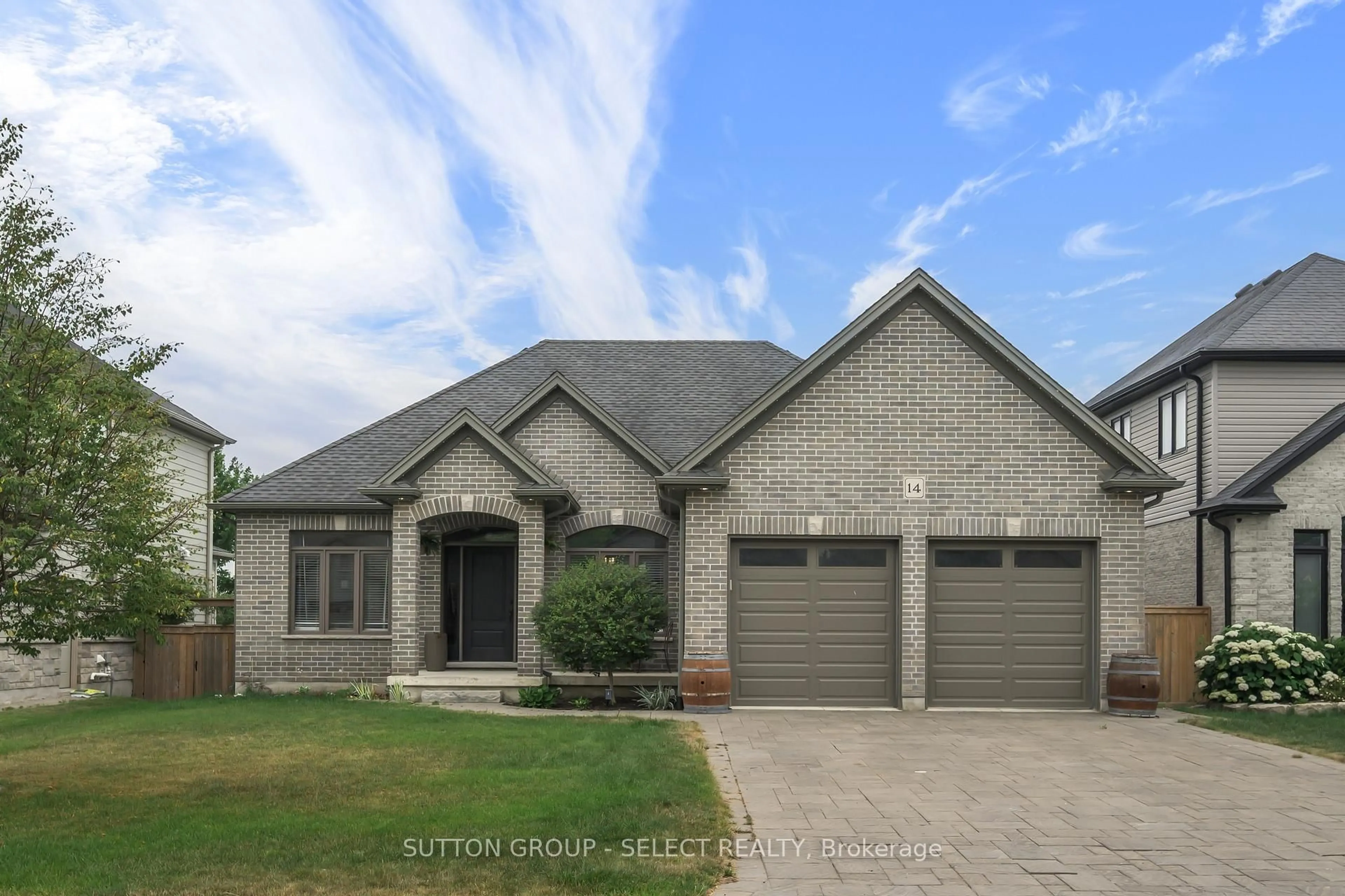 Home with brick exterior material, street for 14 Mayapple Cres, Middlesex Centre Ontario N0M 2A0
