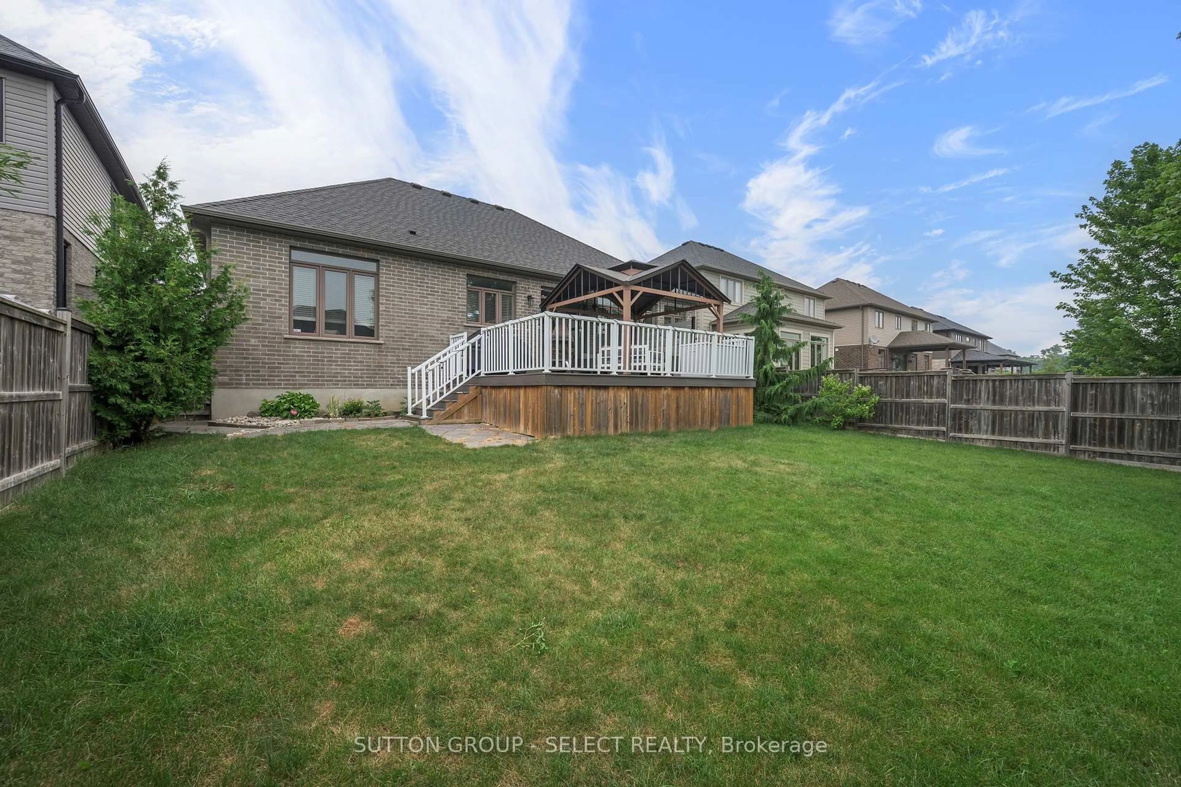A pic from outside/outdoor area/front of a property/back of a property/a pic from drone, unknown for 14 Mayapple Cres, Middlesex Centre Ontario N0M 2A0