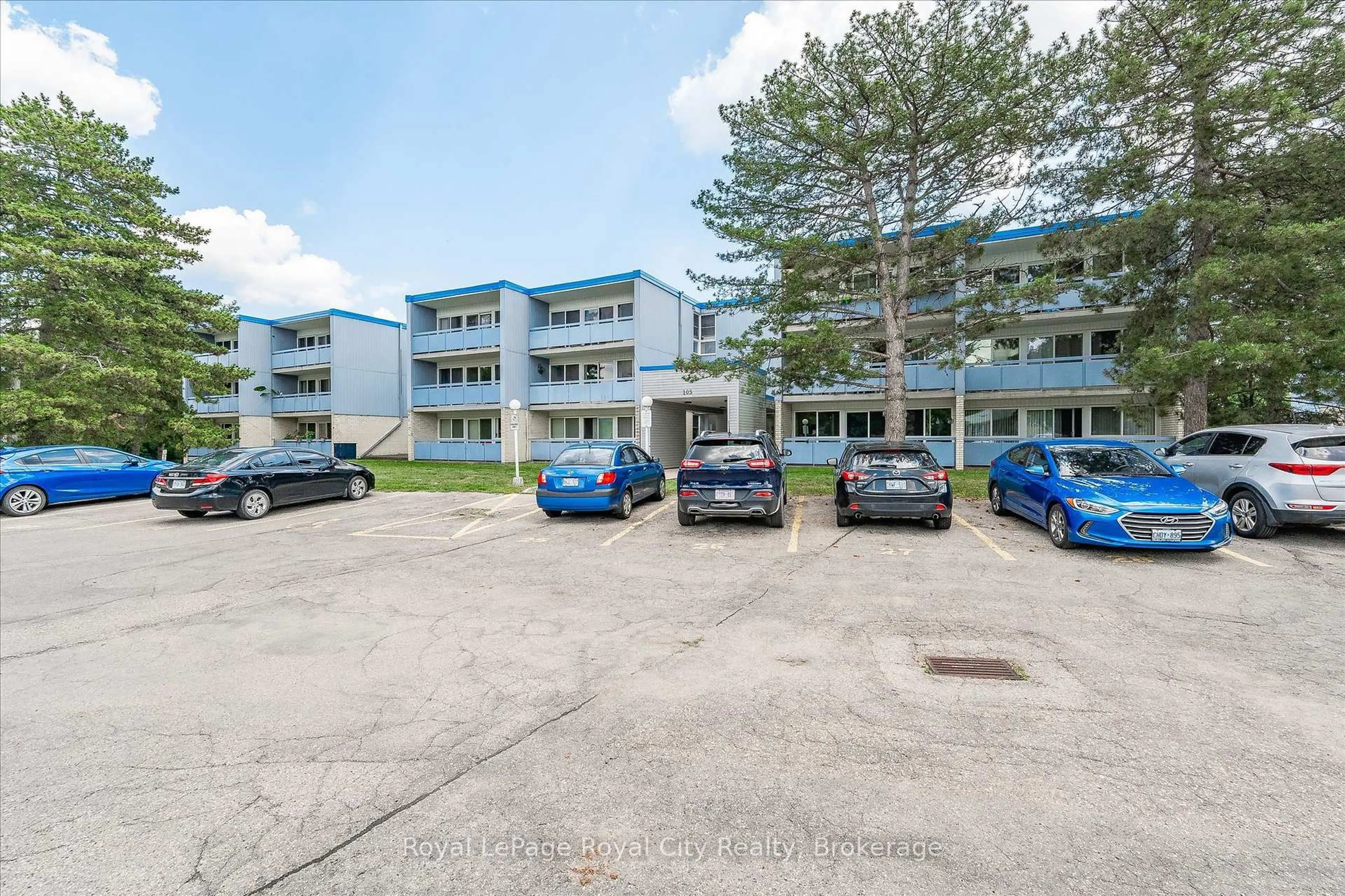 A pic from outside/outdoor area/front of a property/back of a property/a pic from drone, building for 105 Conroy Cres #410, Guelph Ontario N1G 2V5