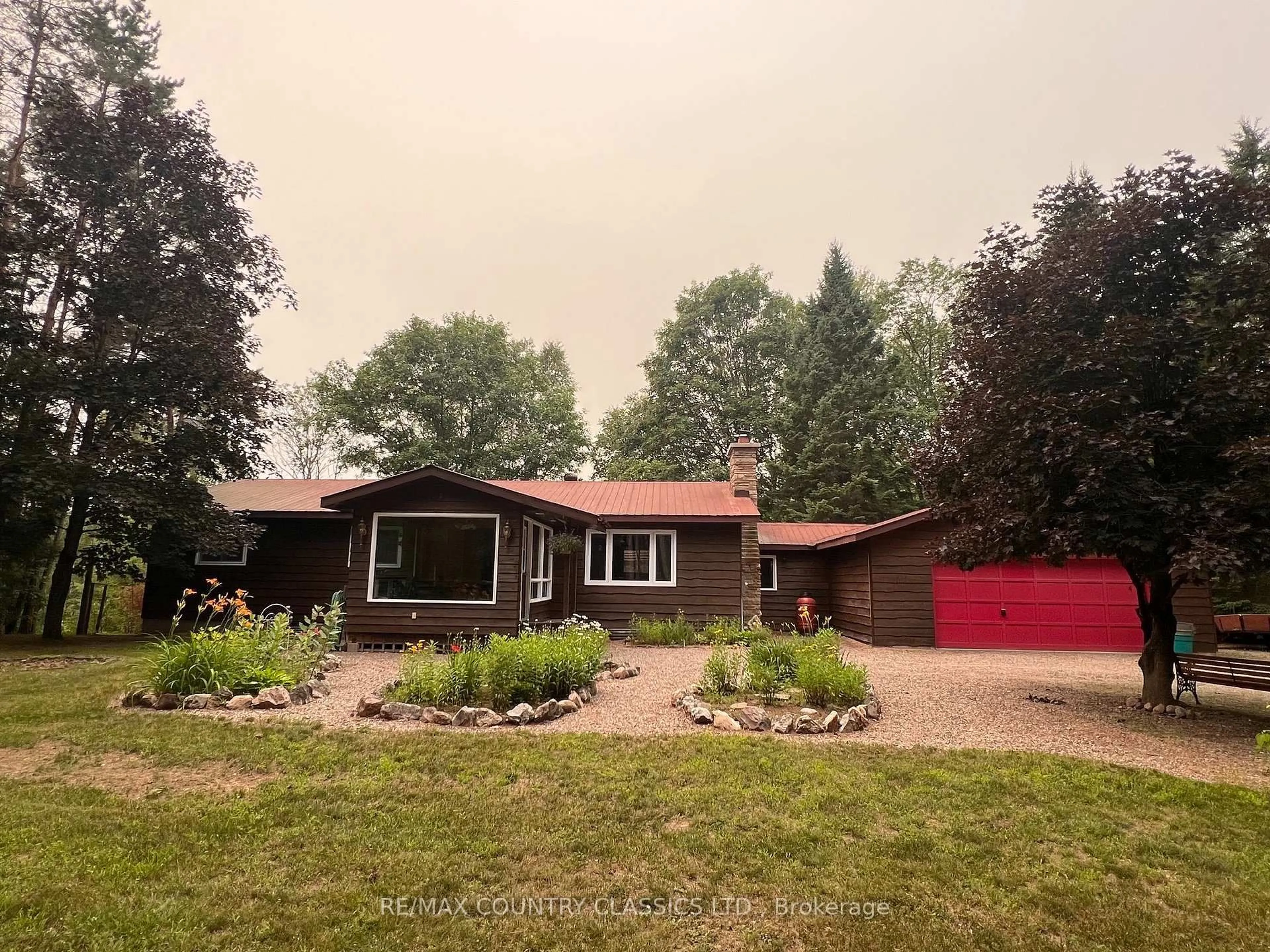 A pic from outside/outdoor area/front of a property/back of a property/a pic from drone, street for 24 Firehall Lane, Bancroft Ontario K0L 1C0