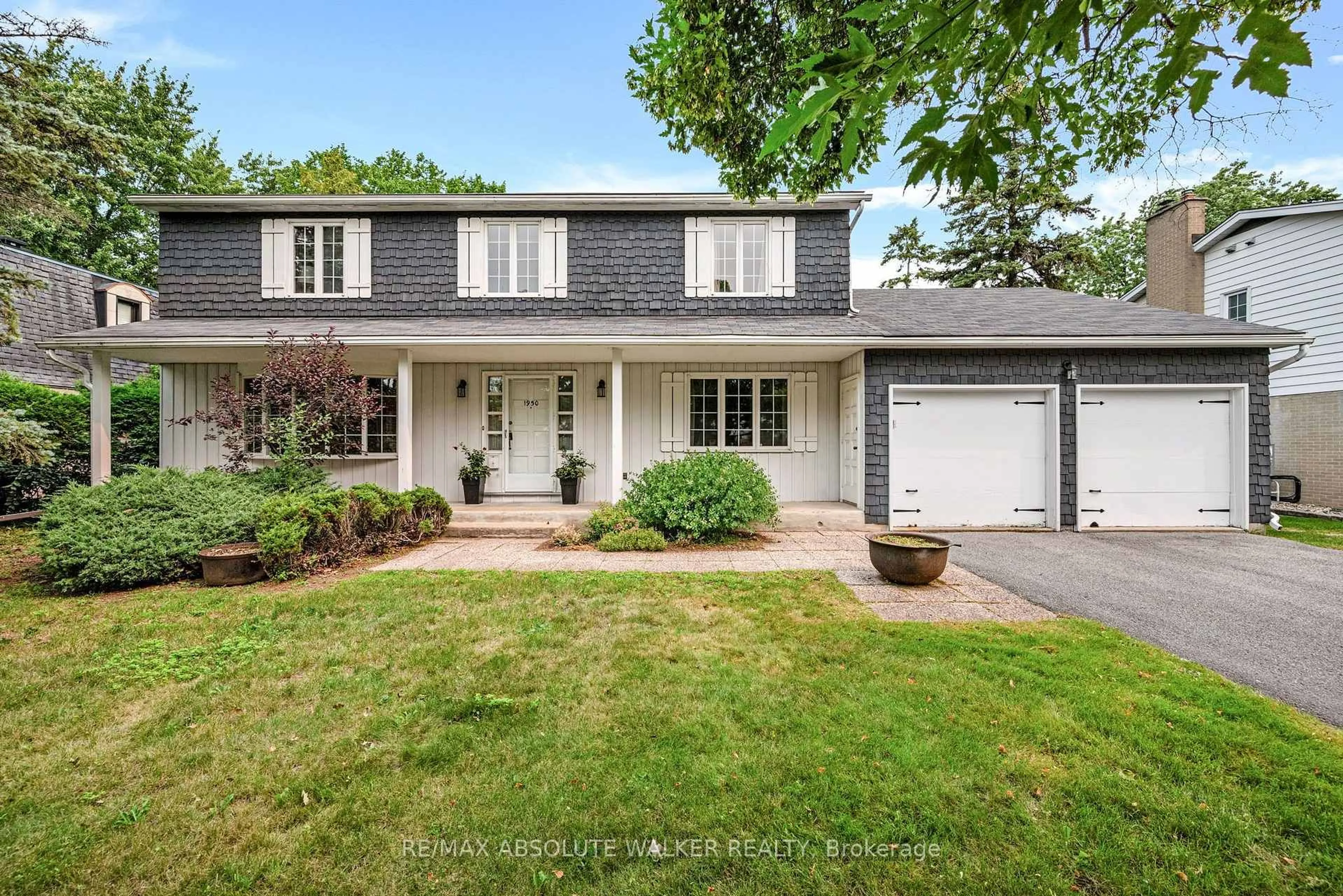 Home with vinyl exterior material, street for 1950 Fairmeadow Cres, Ottawa Ontario K1H 7B9