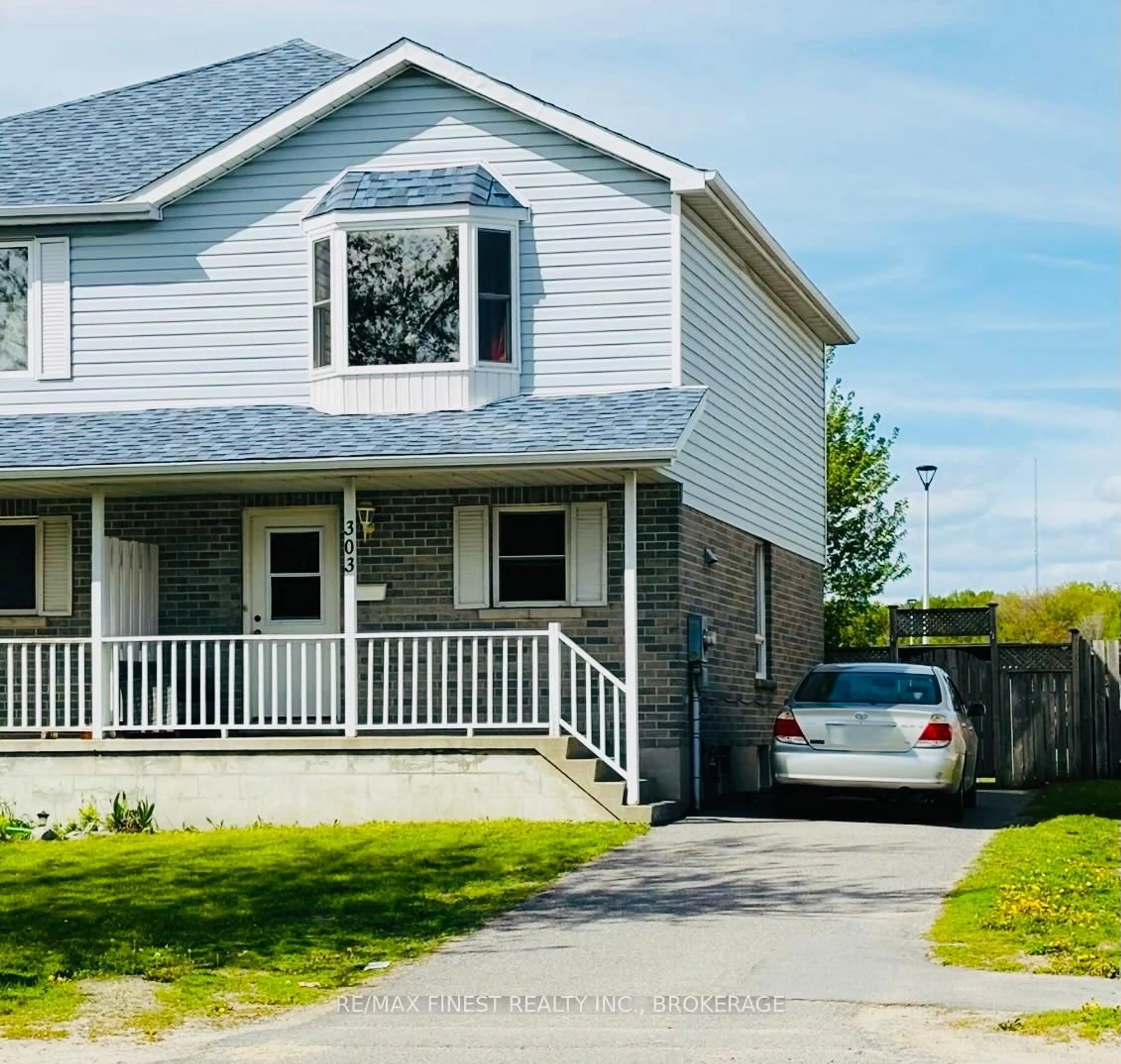 Home with vinyl exterior material, street for 303 Conacher Dr, Kingston Ontario K7K 7J6