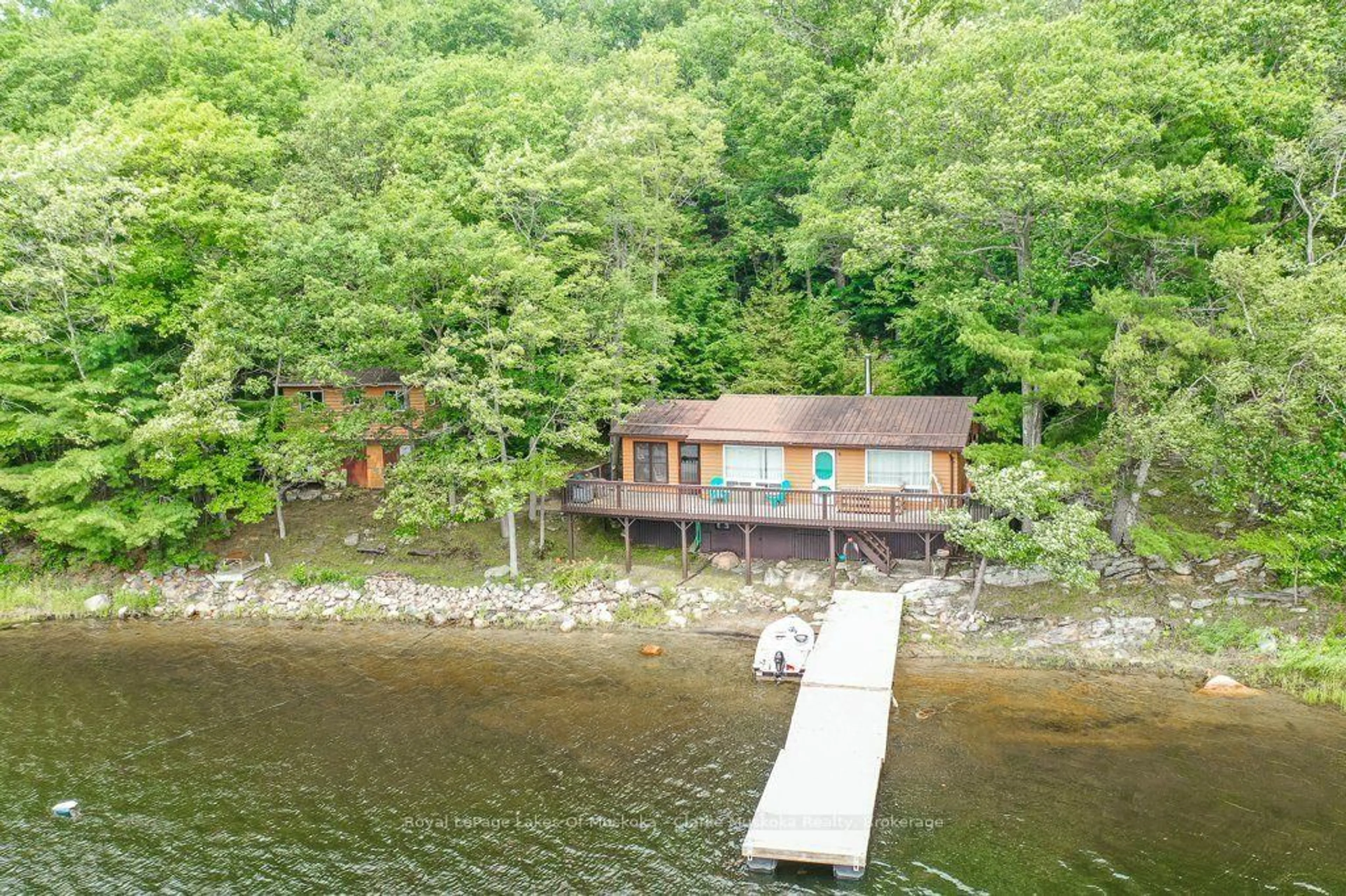 A pic from outside/outdoor area/front of a property/back of a property/a pic from drone, water/lake/river/ocean view for 1053 Harrison Tr, Georgian Bay Ontario P0C 1H0
