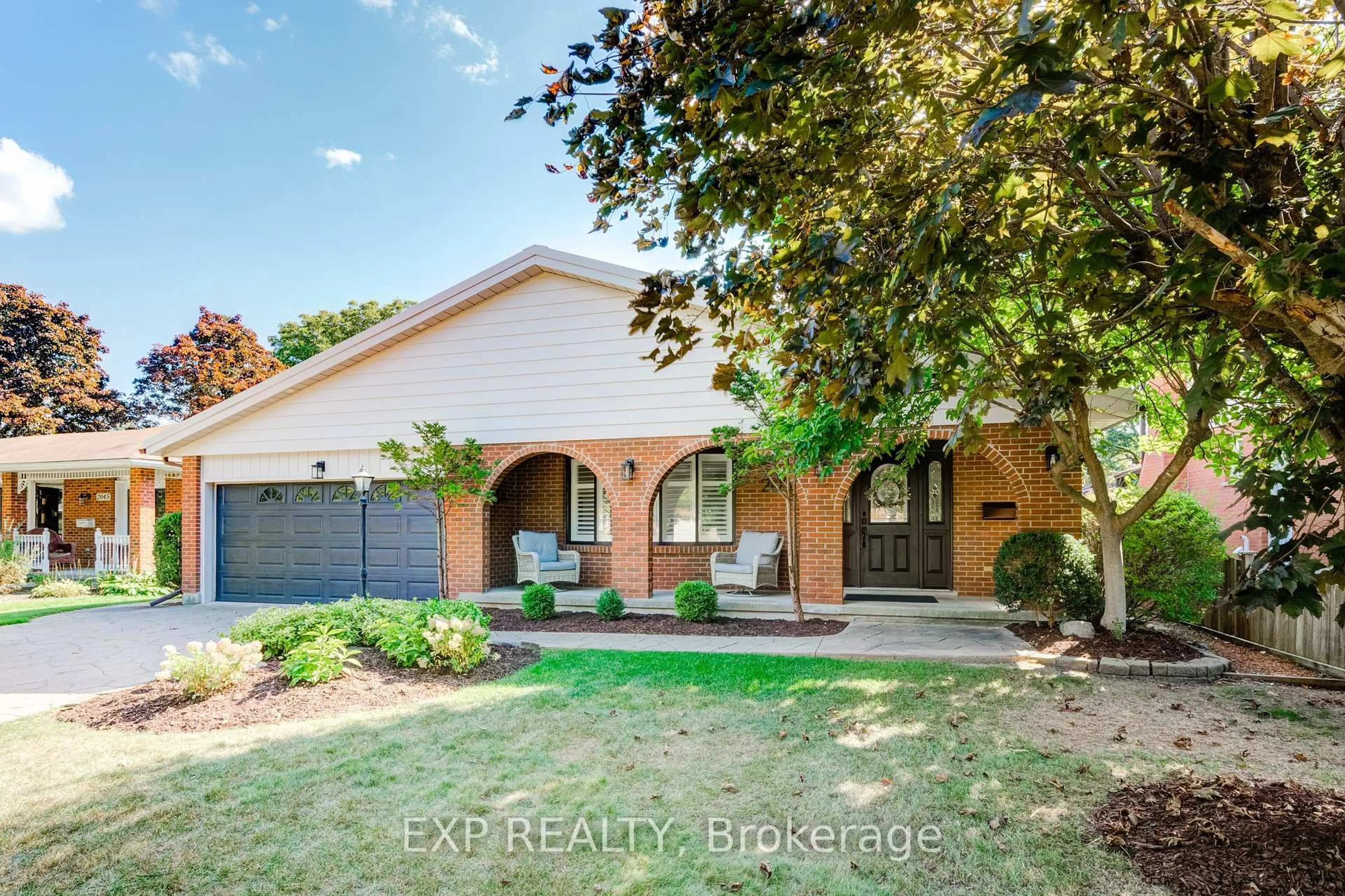 Home with brick exterior material, street for 2035 Old Mill Rd, Kitchener Ontario N2P 1E4