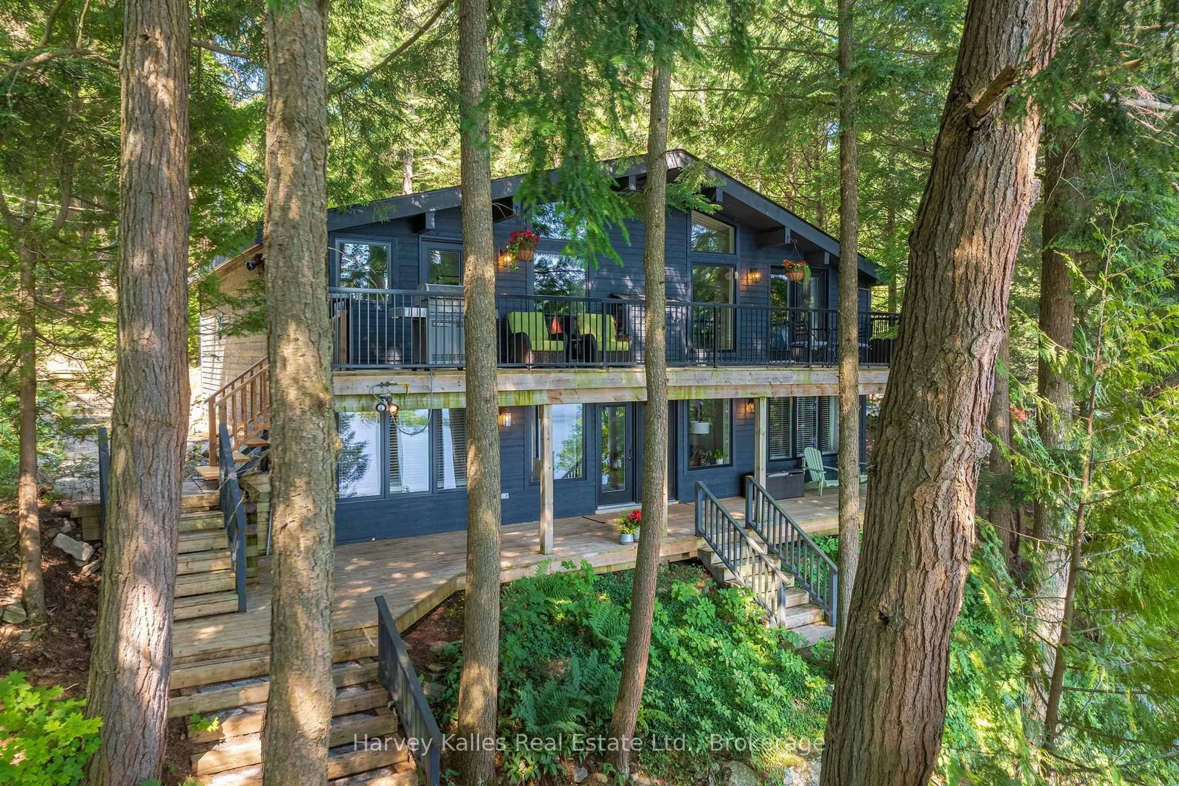 A pic from outside/outdoor area/front of a property/back of a property/a pic from drone, forest/trees view for 1075 Hallett Rd, Muskoka Lakes Ontario P0C 1H0