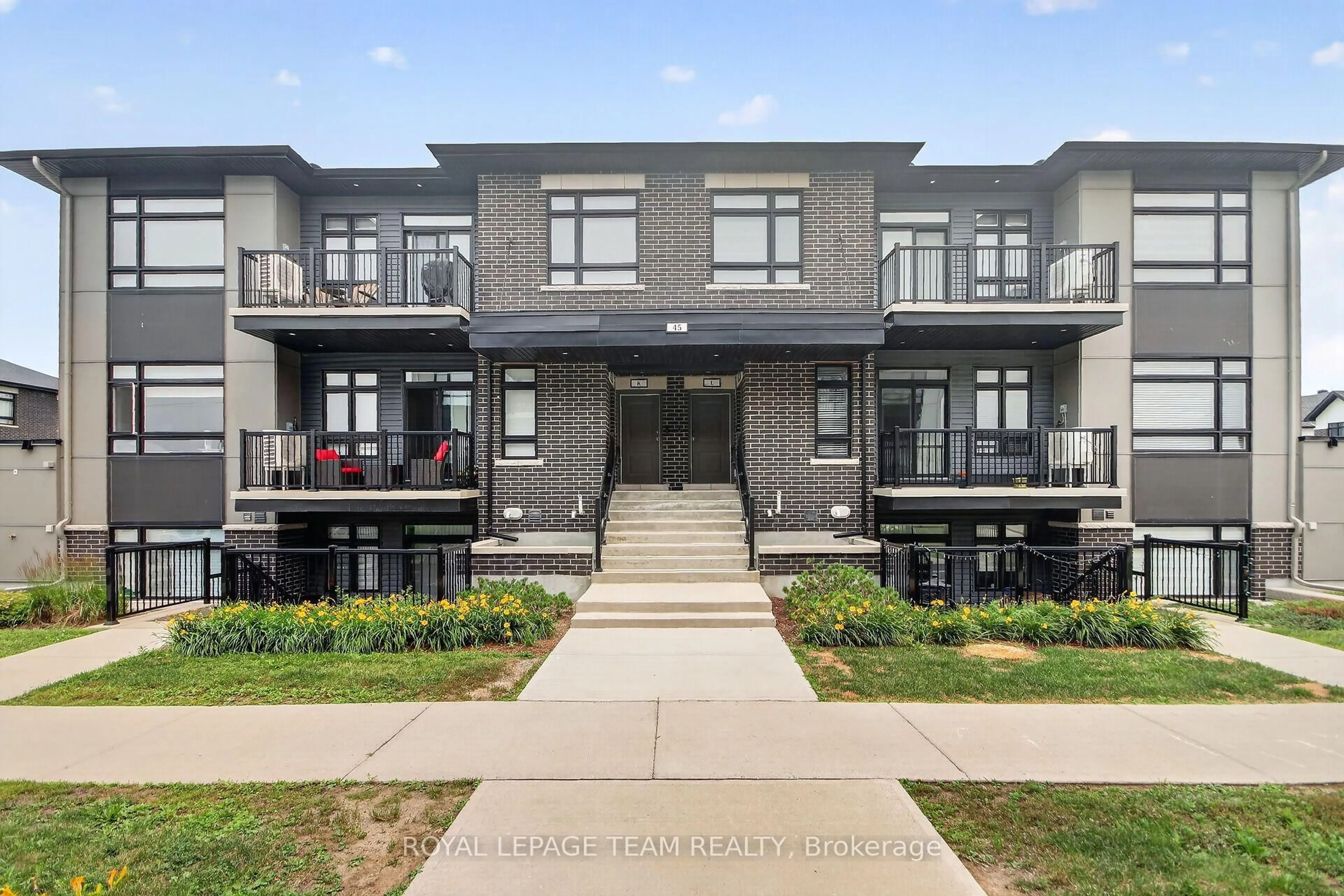 Home with brick exterior material, unknown for 45 Overberg Way #H, Ottawa Ontario K2S 2Y4