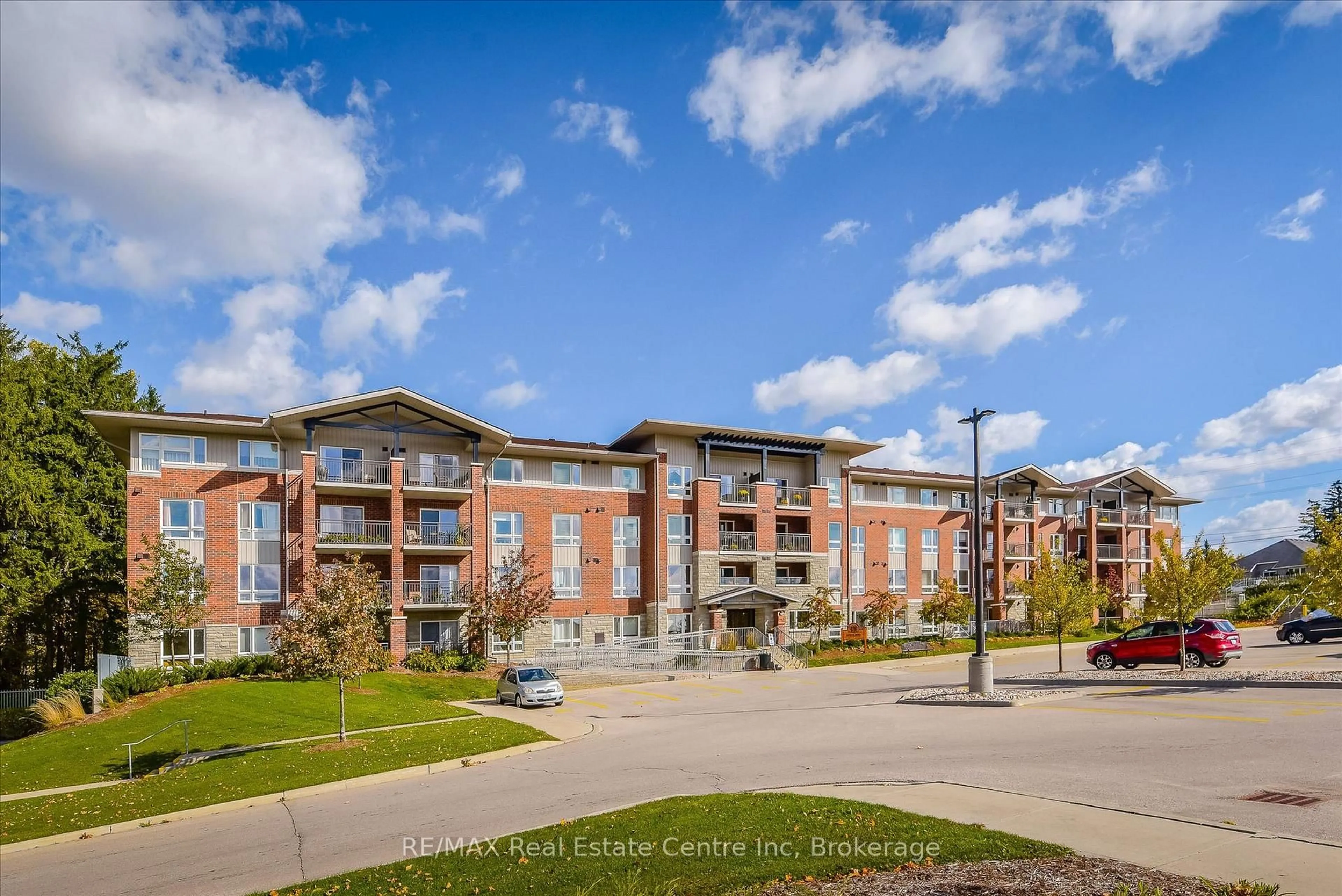 A pic from outside/outdoor area/front of a property/back of a property/a pic from drone, building for 645 St David St #302, Centre Wellington Ontario N1M 0A9