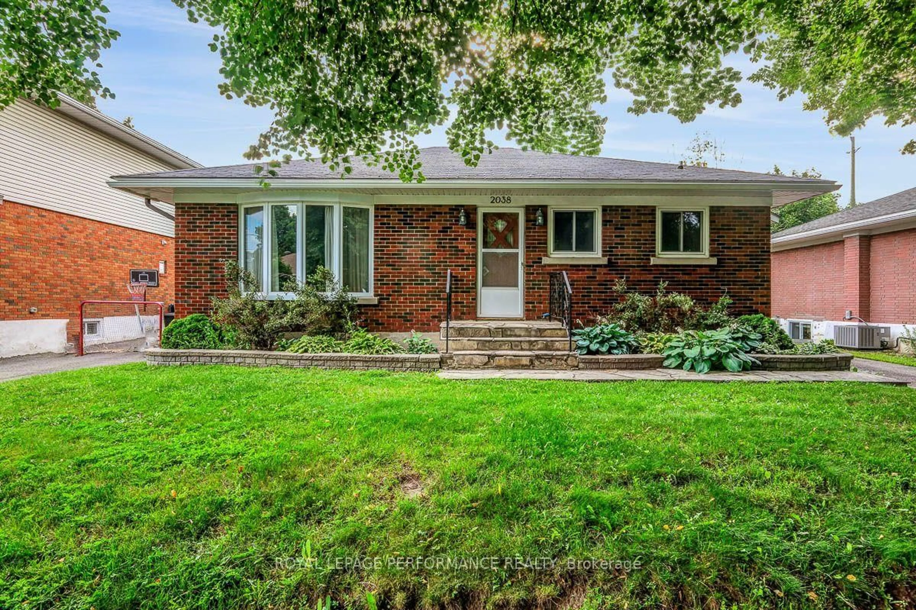 Home with brick exterior material, street for 2038 Arch St, Ottawa Ontario K1G 2H1