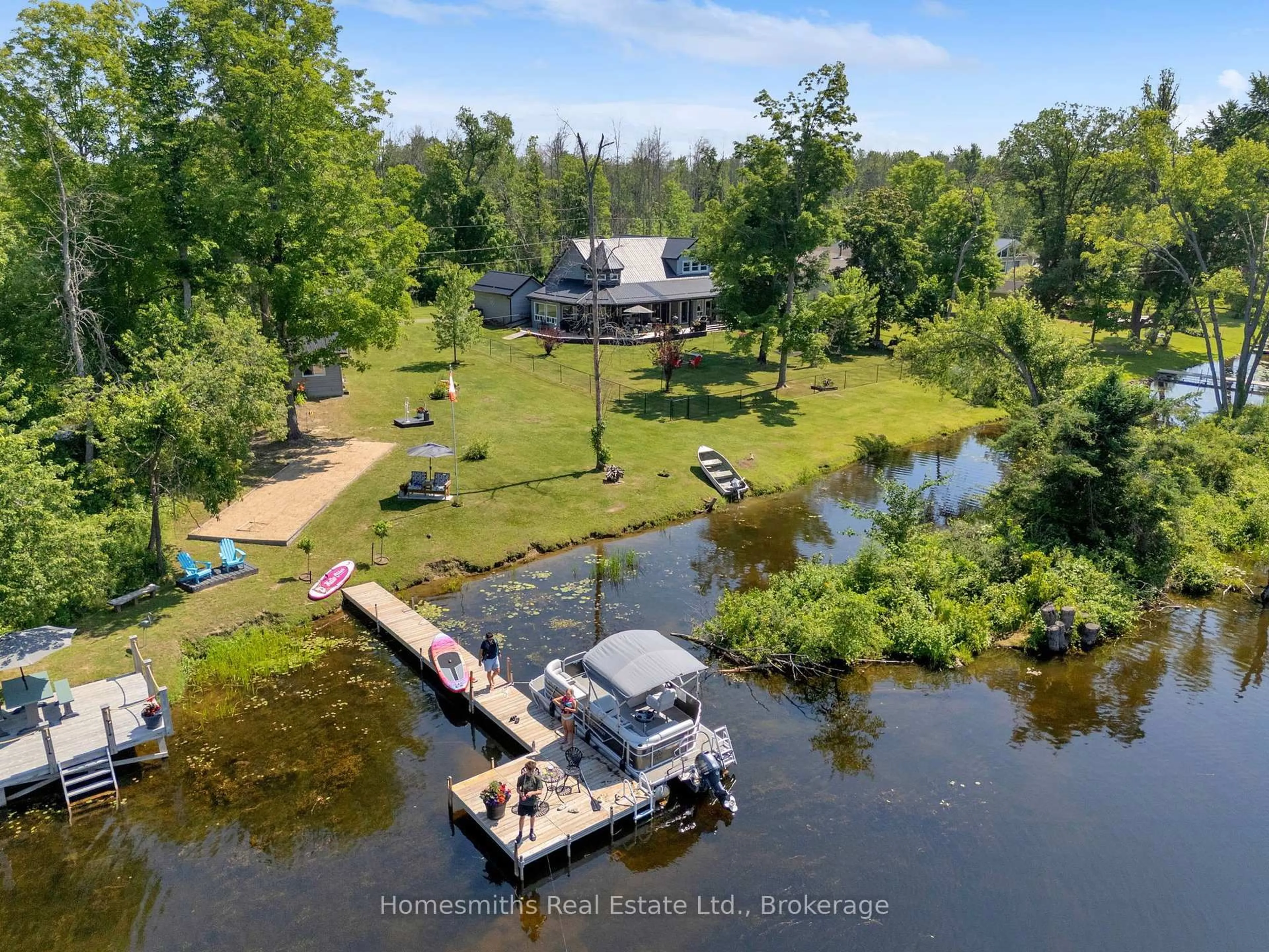 A pic from outside/outdoor area/front of a property/back of a property/a pic from drone, water/lake/river/ocean view for 14 Fidlar Crt, Limoges Ontario K0K 2M0