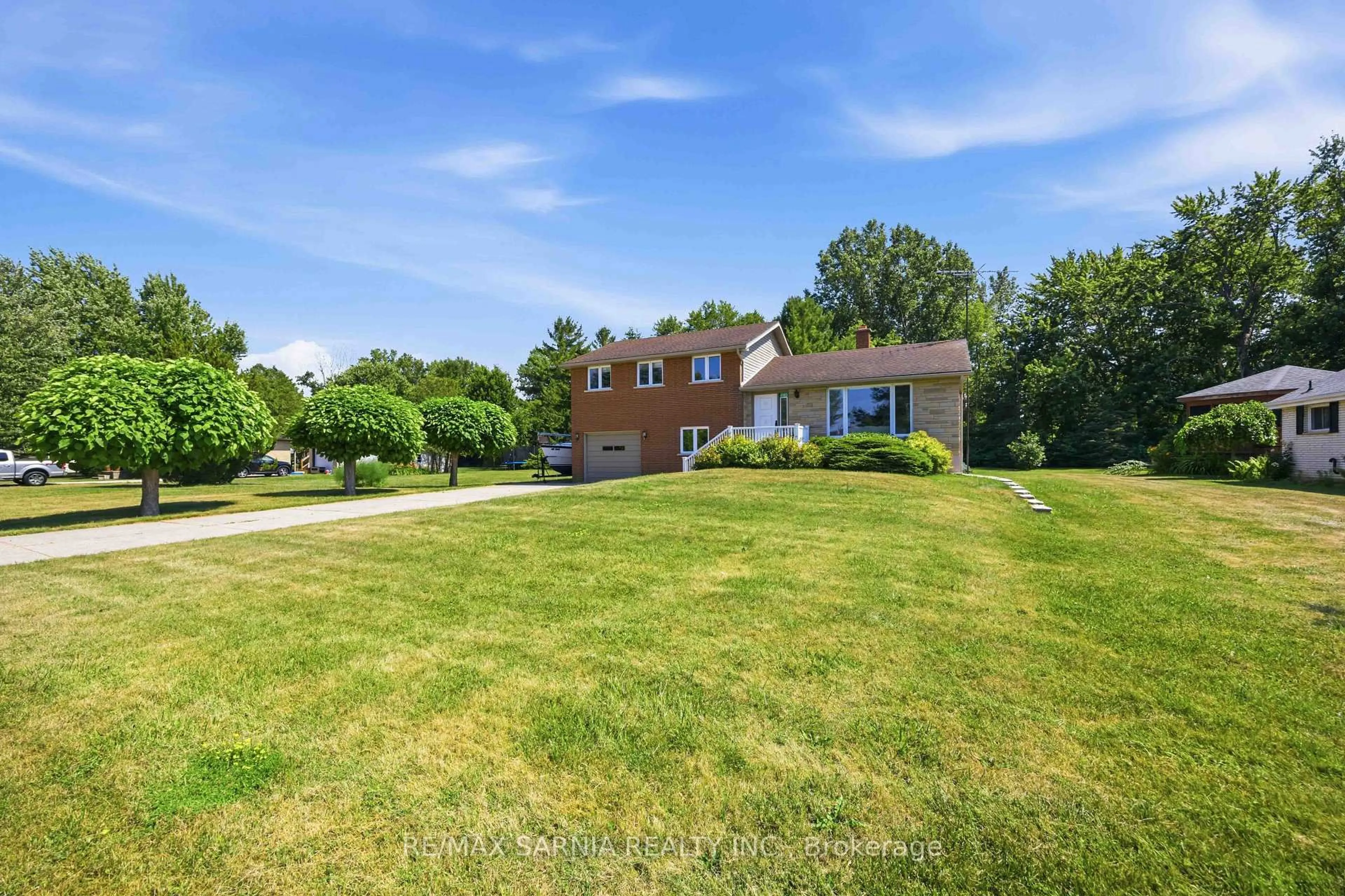 A pic from outside/outdoor area/front of a property/back of a property/a pic from drone, unknown for 4193 Bluepoint Dr, Plympton-Wyoming Ontario N0N 1J6