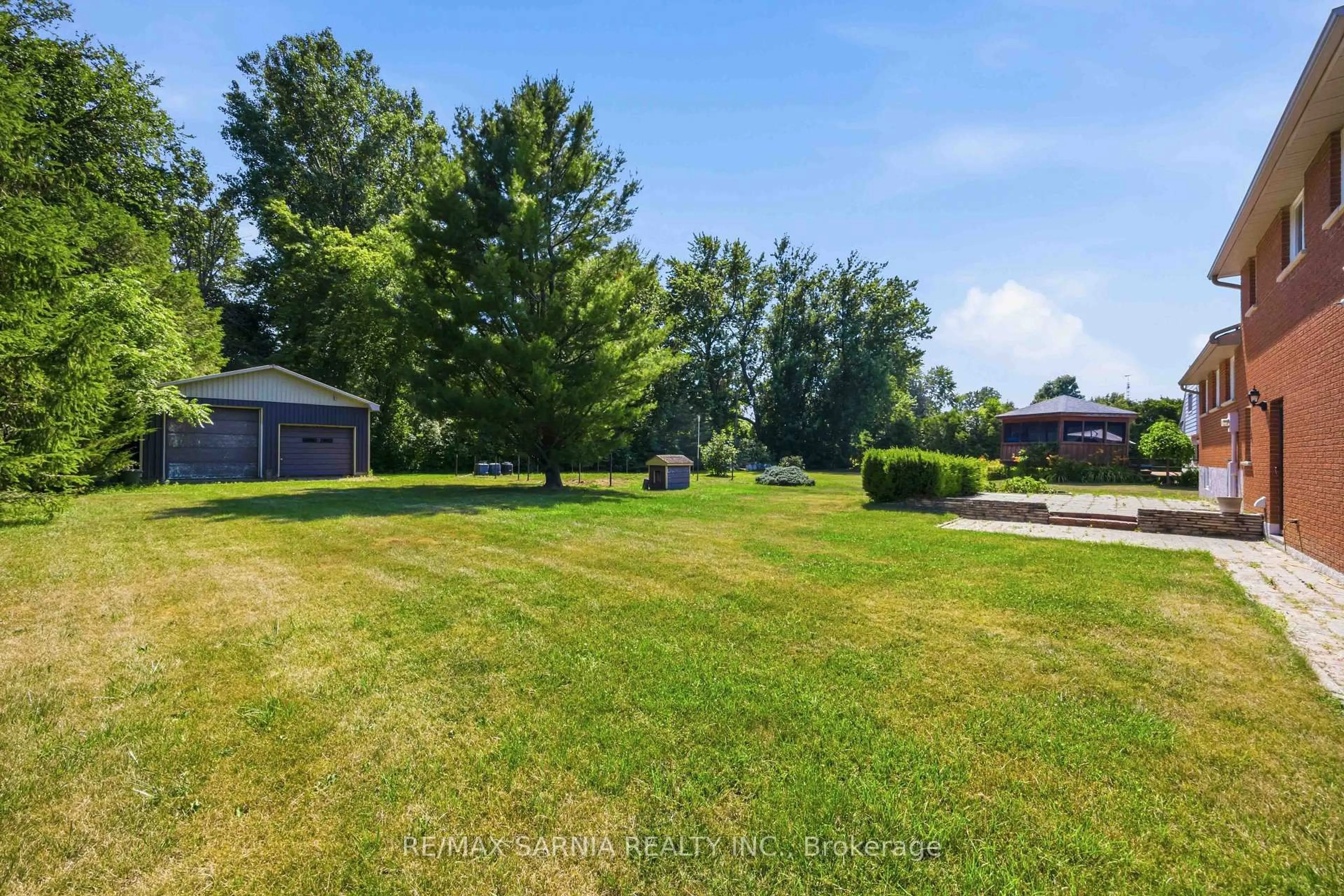 A pic from outside/outdoor area/front of a property/back of a property/a pic from drone, water/lake/river/ocean view for 4193 Bluepoint Dr, Plympton-Wyoming Ontario N0N 1J6