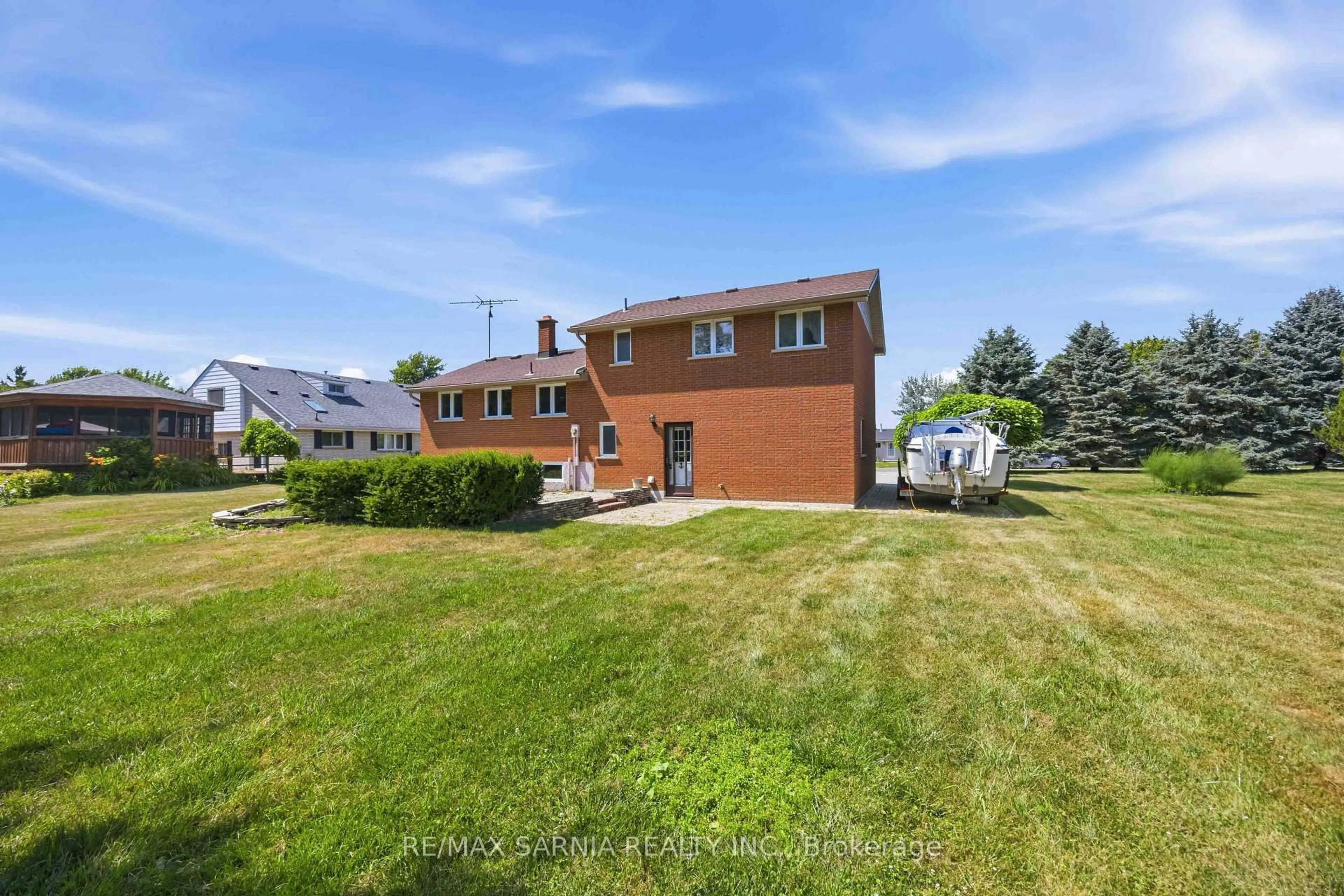 A pic from outside/outdoor area/front of a property/back of a property/a pic from drone, street for 4193 Bluepoint Dr, Plympton-Wyoming Ontario N0N 1J6