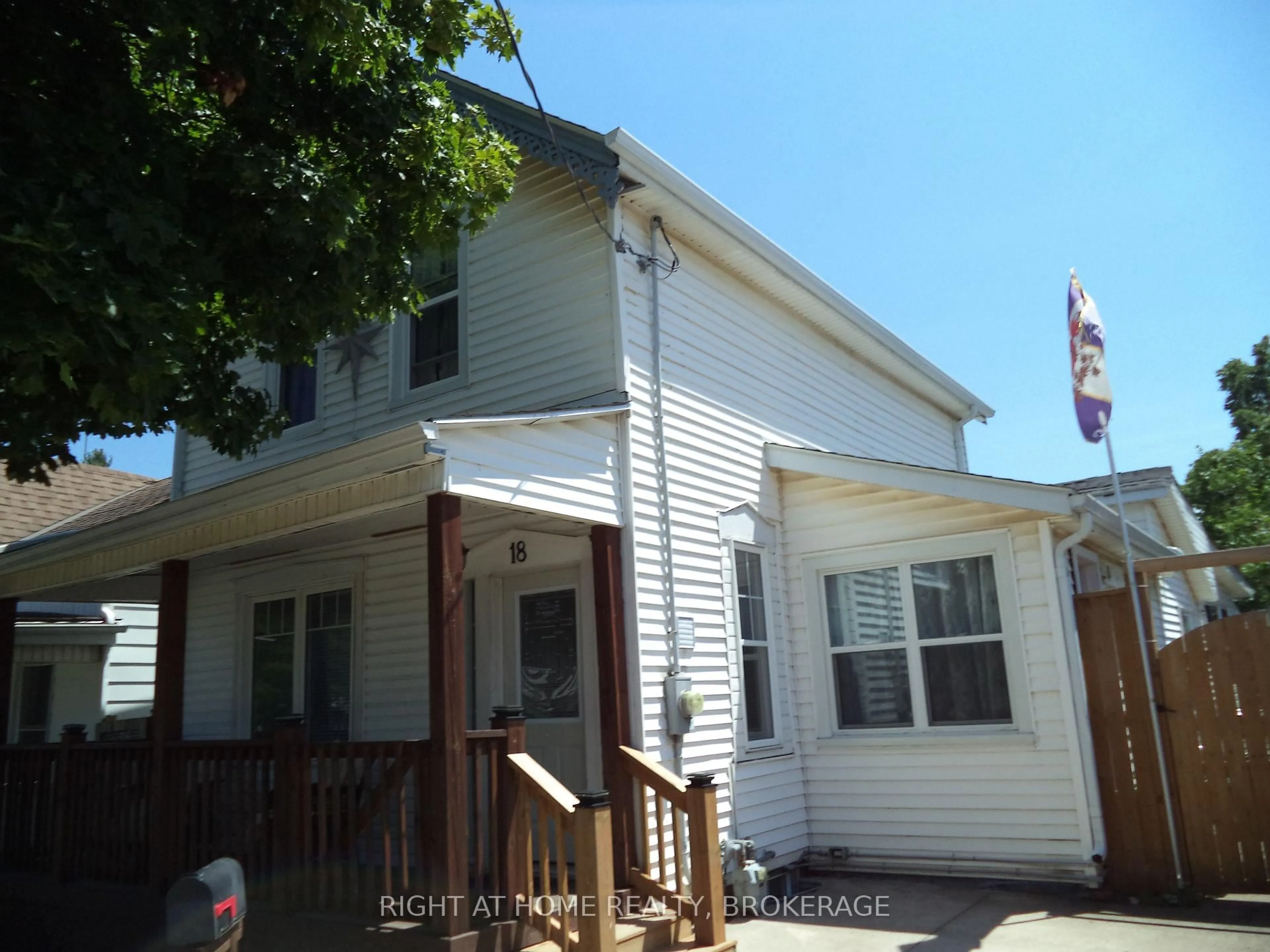 Home with vinyl exterior material, street for 18 Almond St, St. Catharines Ontario L2T 1E9