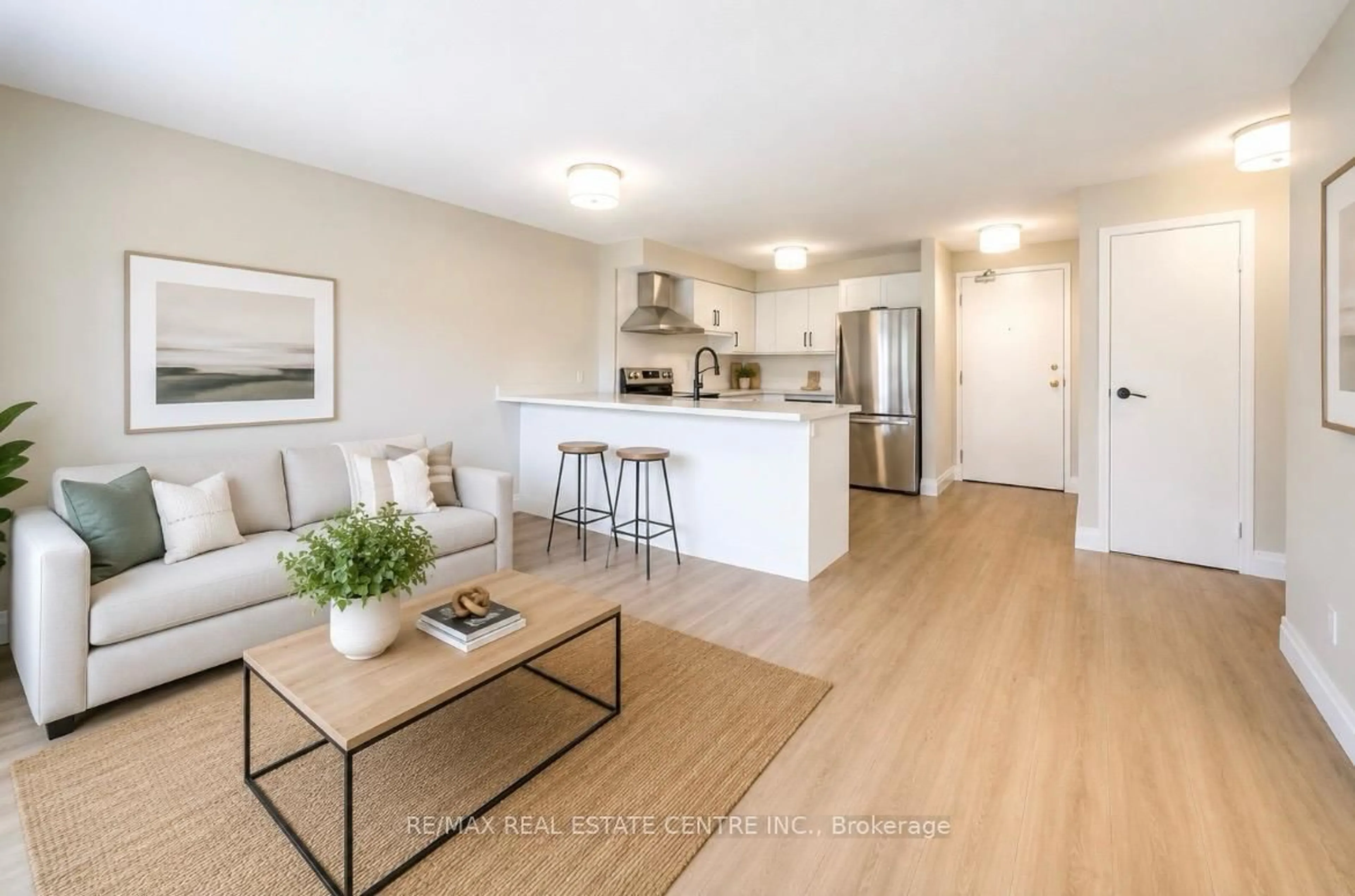 Open concept kitchen, wood/laminate floor for 30 Hugo Cres #107, Kitchener Ontario N2M 3Z2
