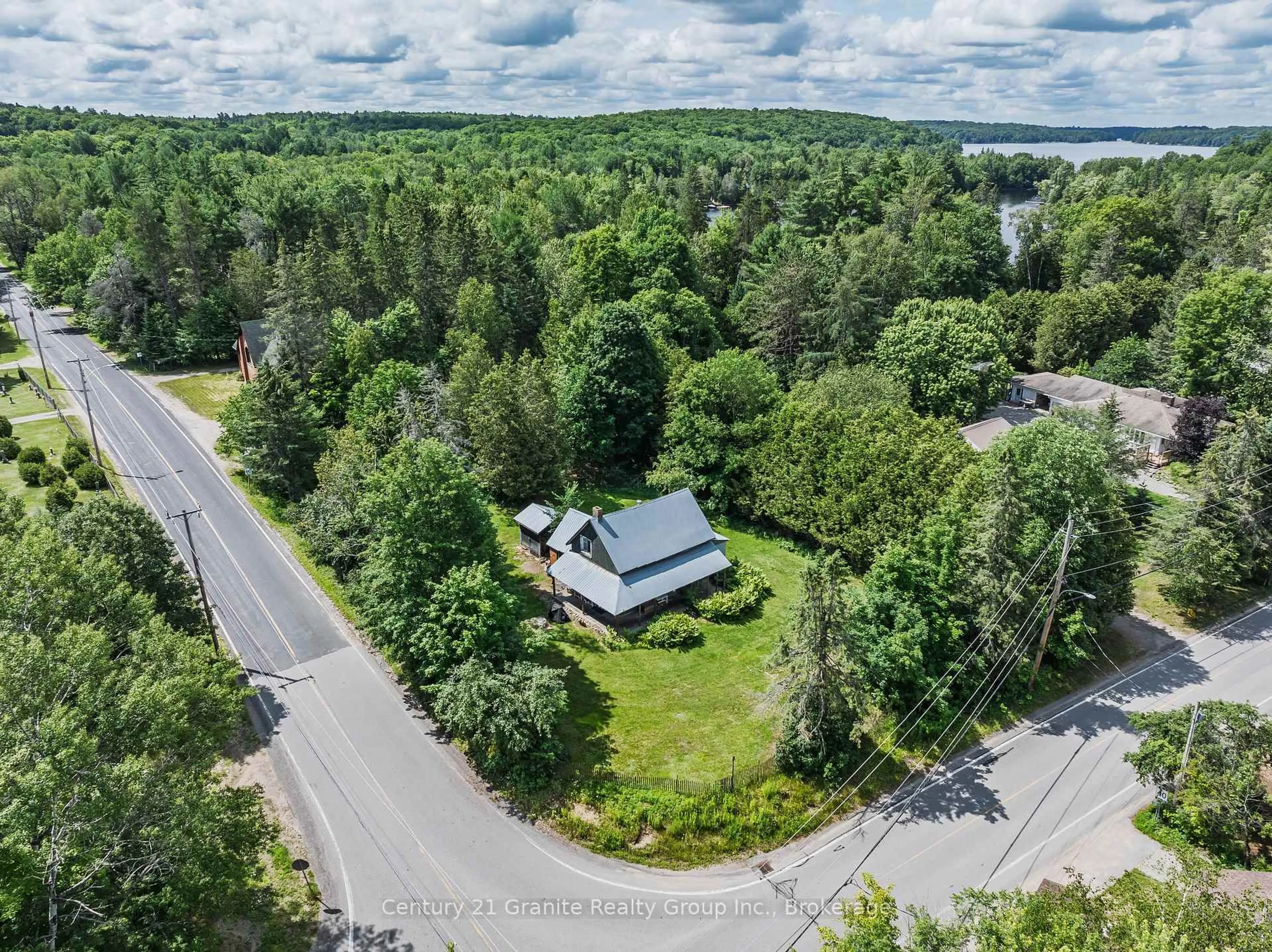 A pic from outside/outdoor area/front of a property/back of a property/a pic from drone, forest/trees view for 1745 Ingoldsby Rd, Minden Hills Ontario K0M 2K0