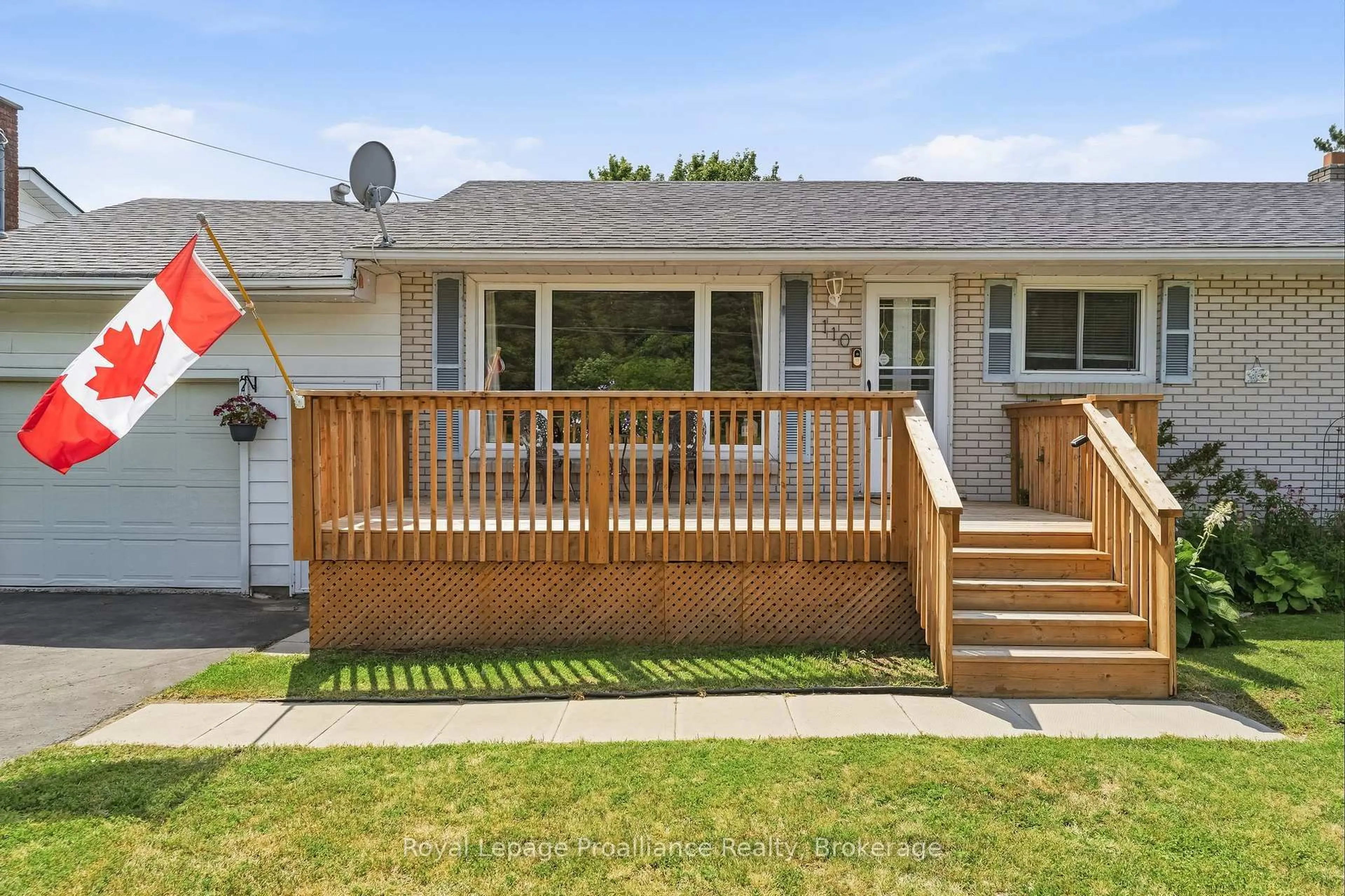 Home with vinyl exterior material, street for 110 Ontario St, Brighton Ontario K0K 1H0